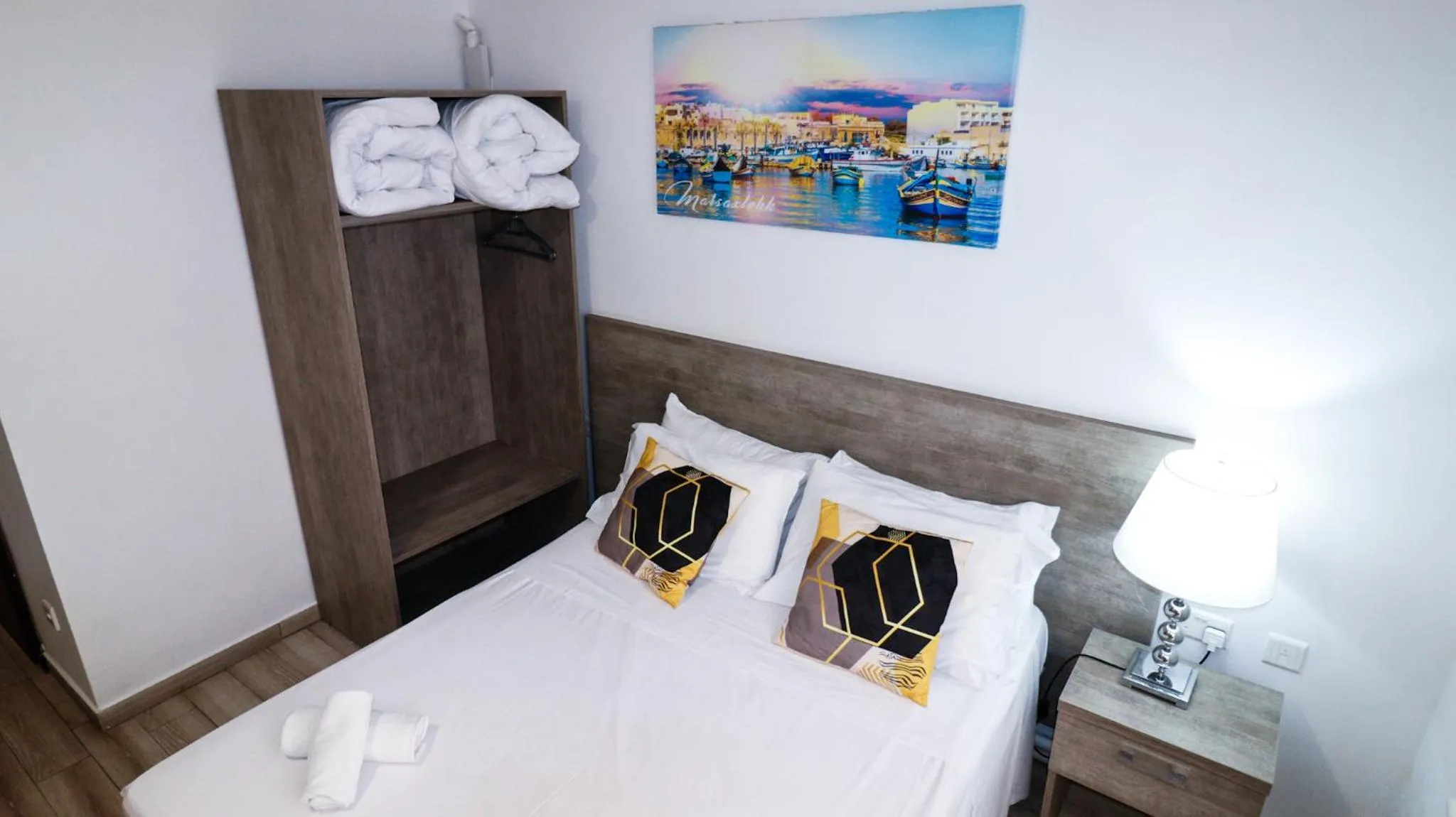 Bed in Napoli Suites Studios Aparthotel