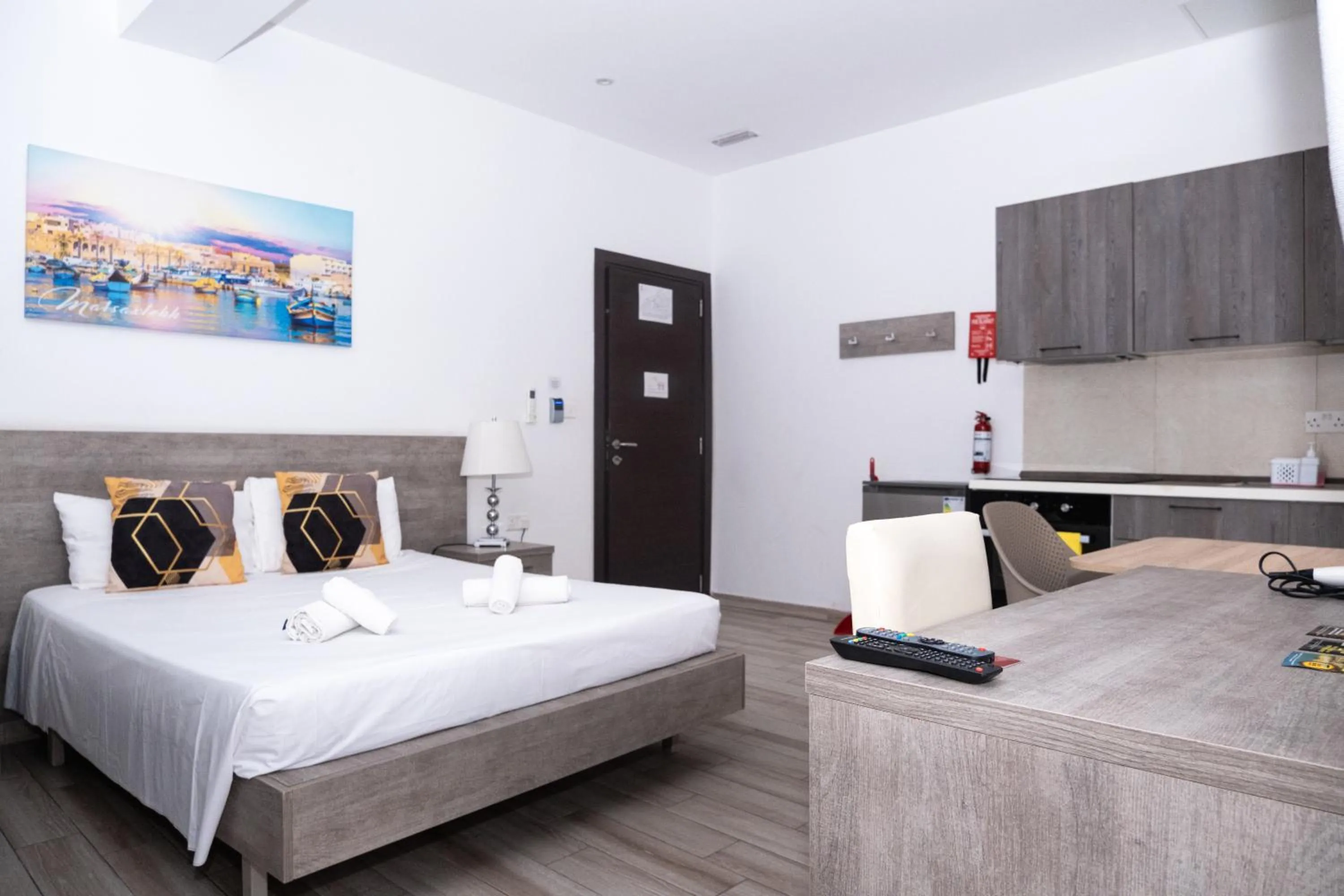 Bed in Napoli Suites Studios Aparthotel