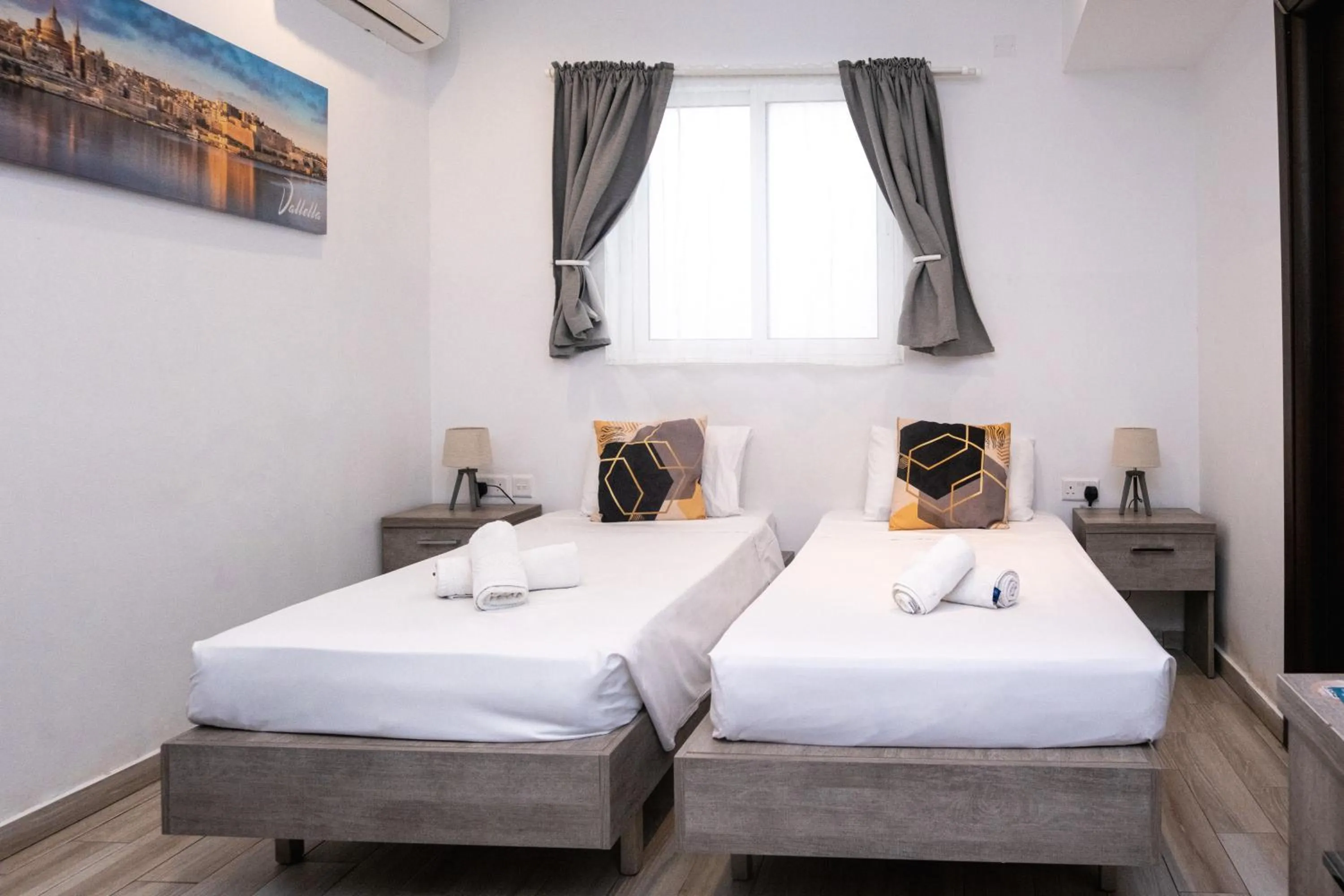 Bed in Napoli Suites Studios Aparthotel