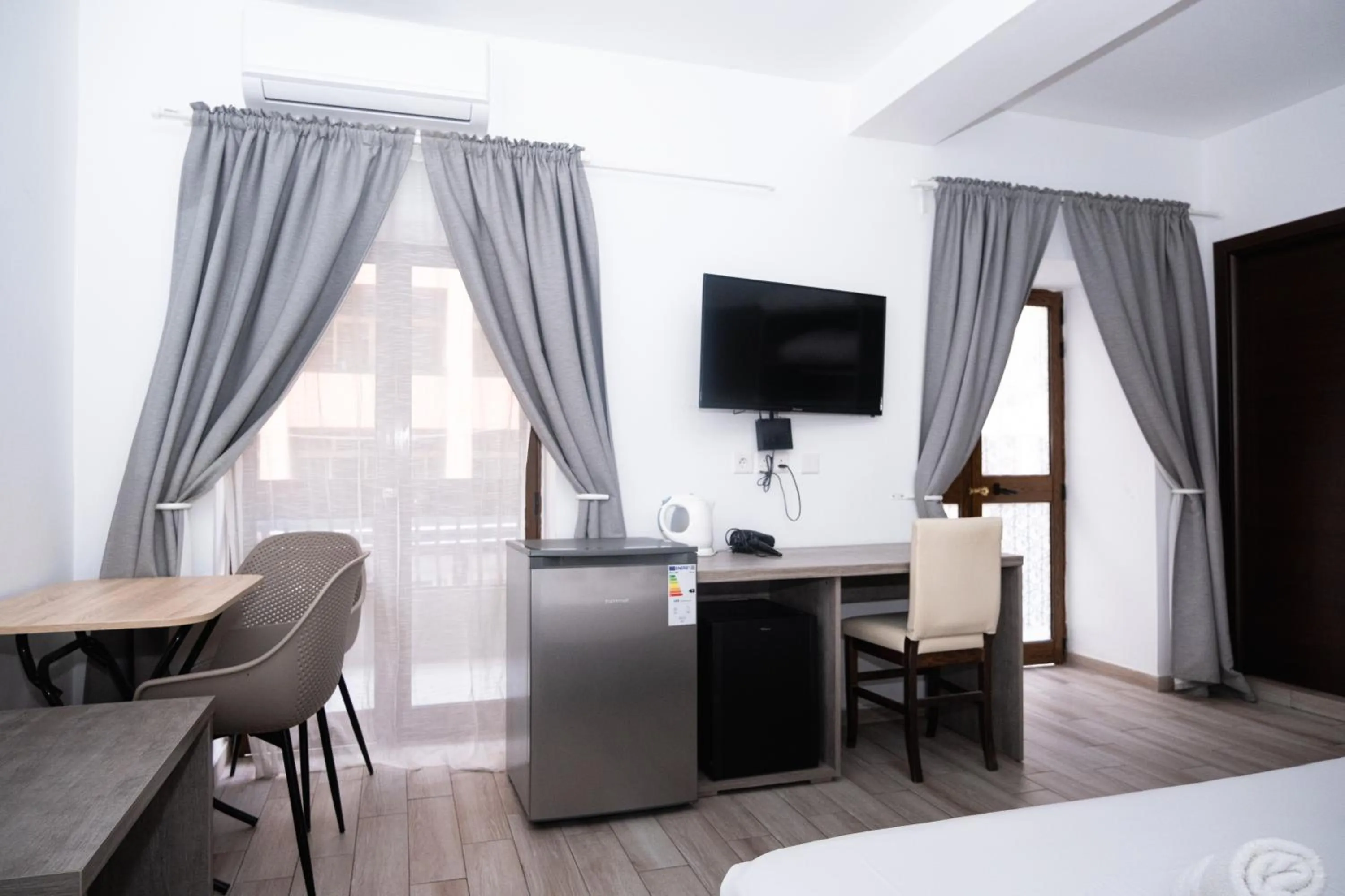 Bed in Napoli Suites Studios Aparthotel