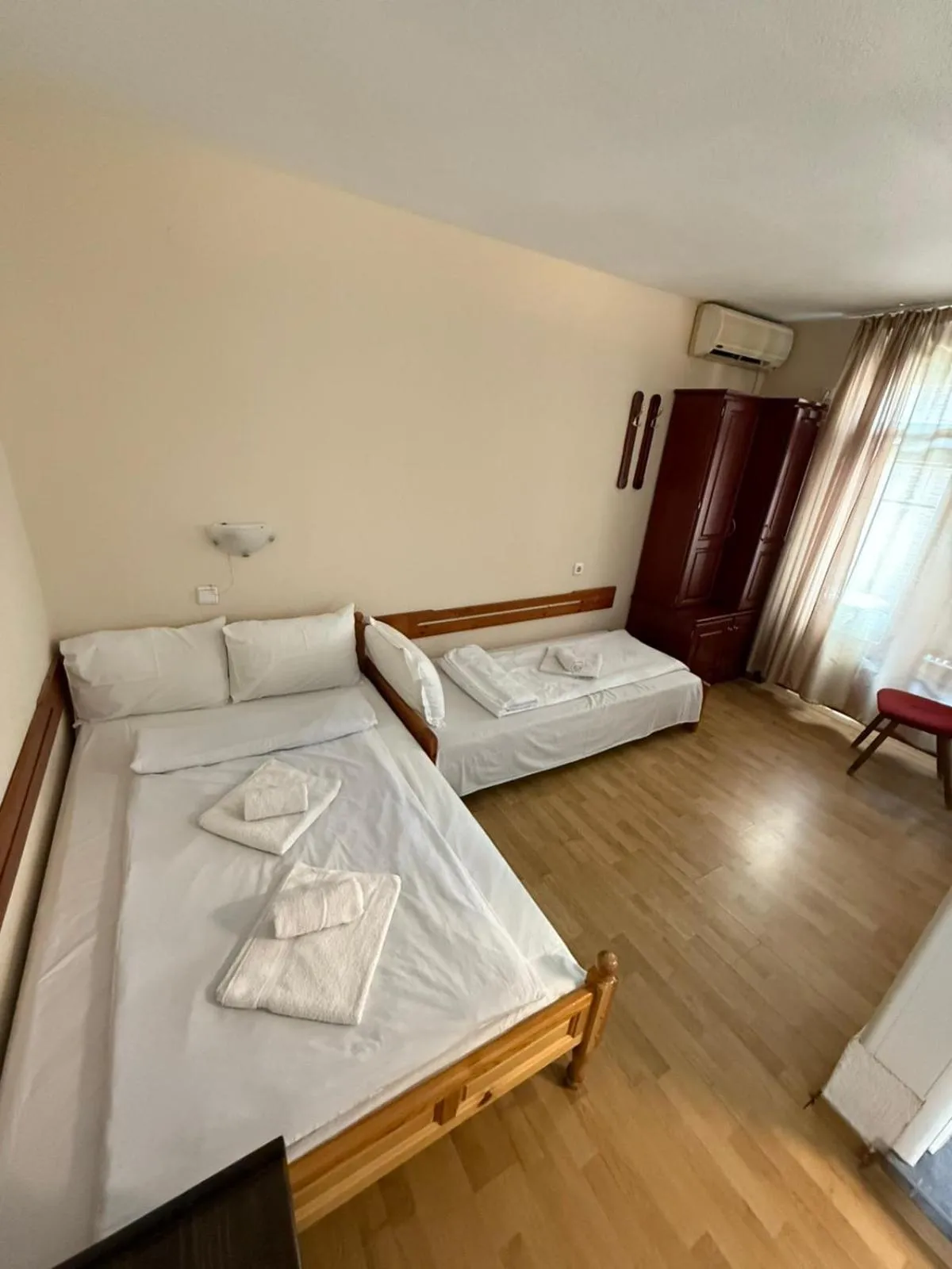 Bed in Family Hotel Studio