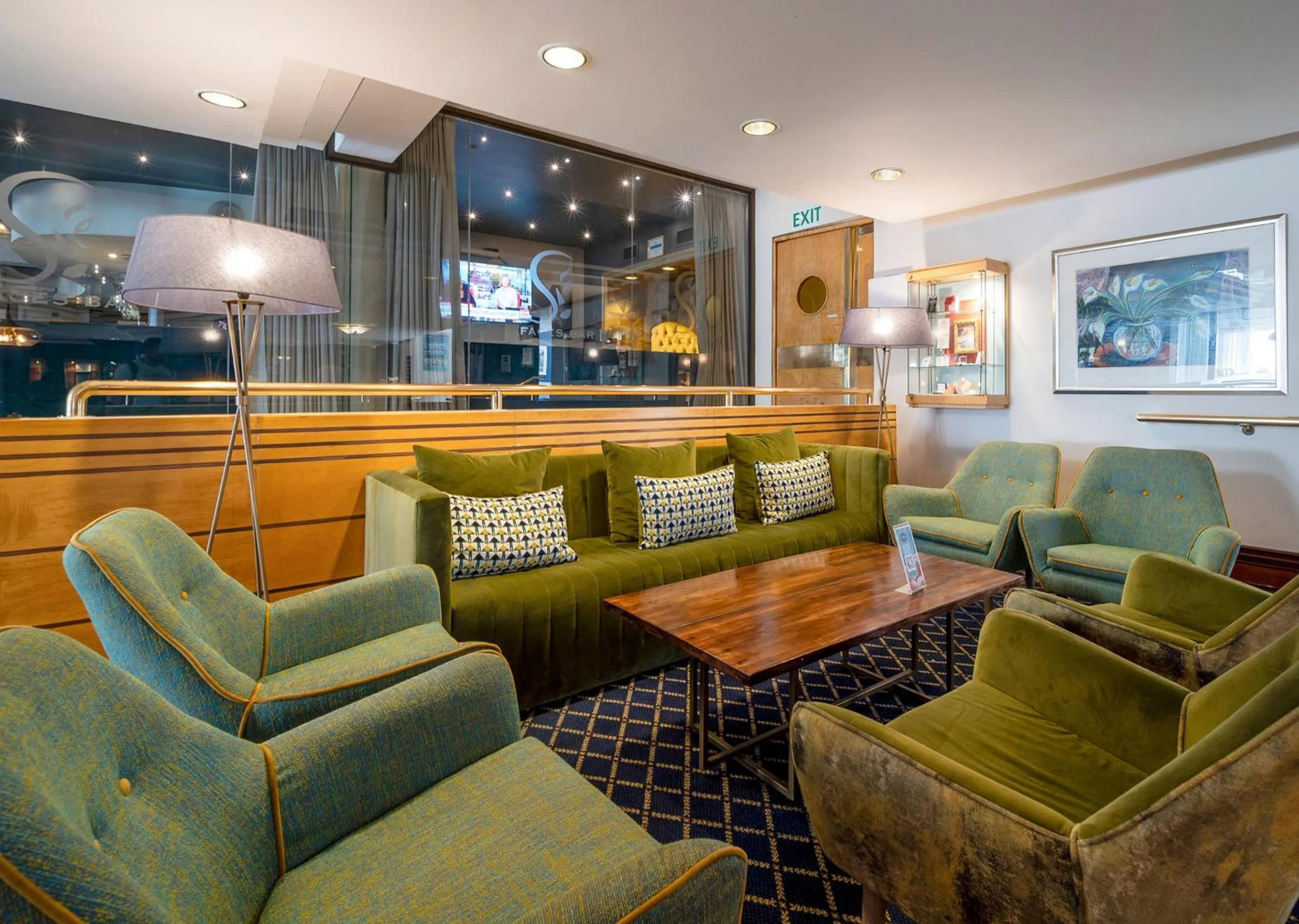 Lobby or reception in Peninsula All Suite Hotel by Dream Resorts