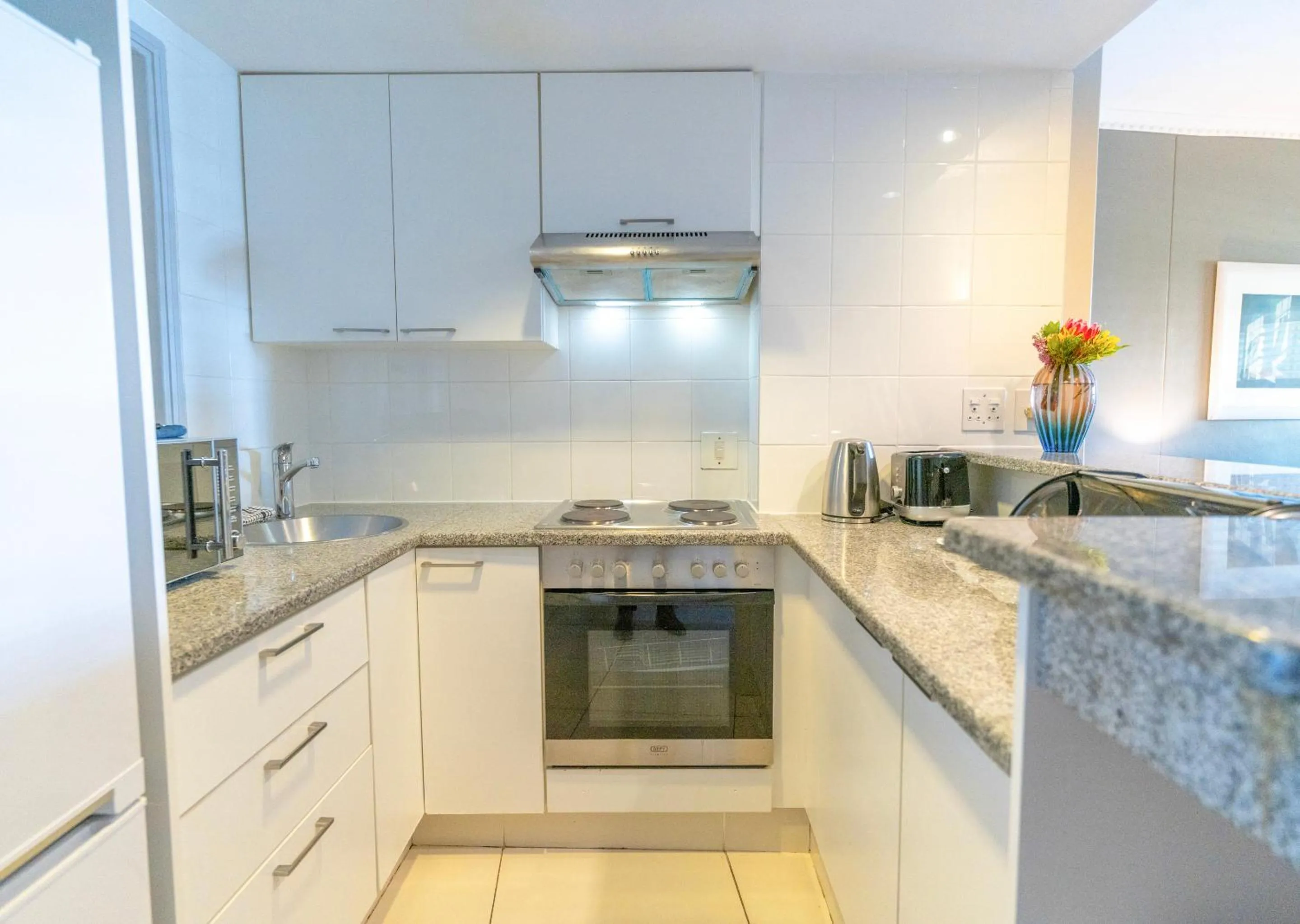 Kitchen or kitchenette in Peninsula All Suite Hotel by Dream Resorts