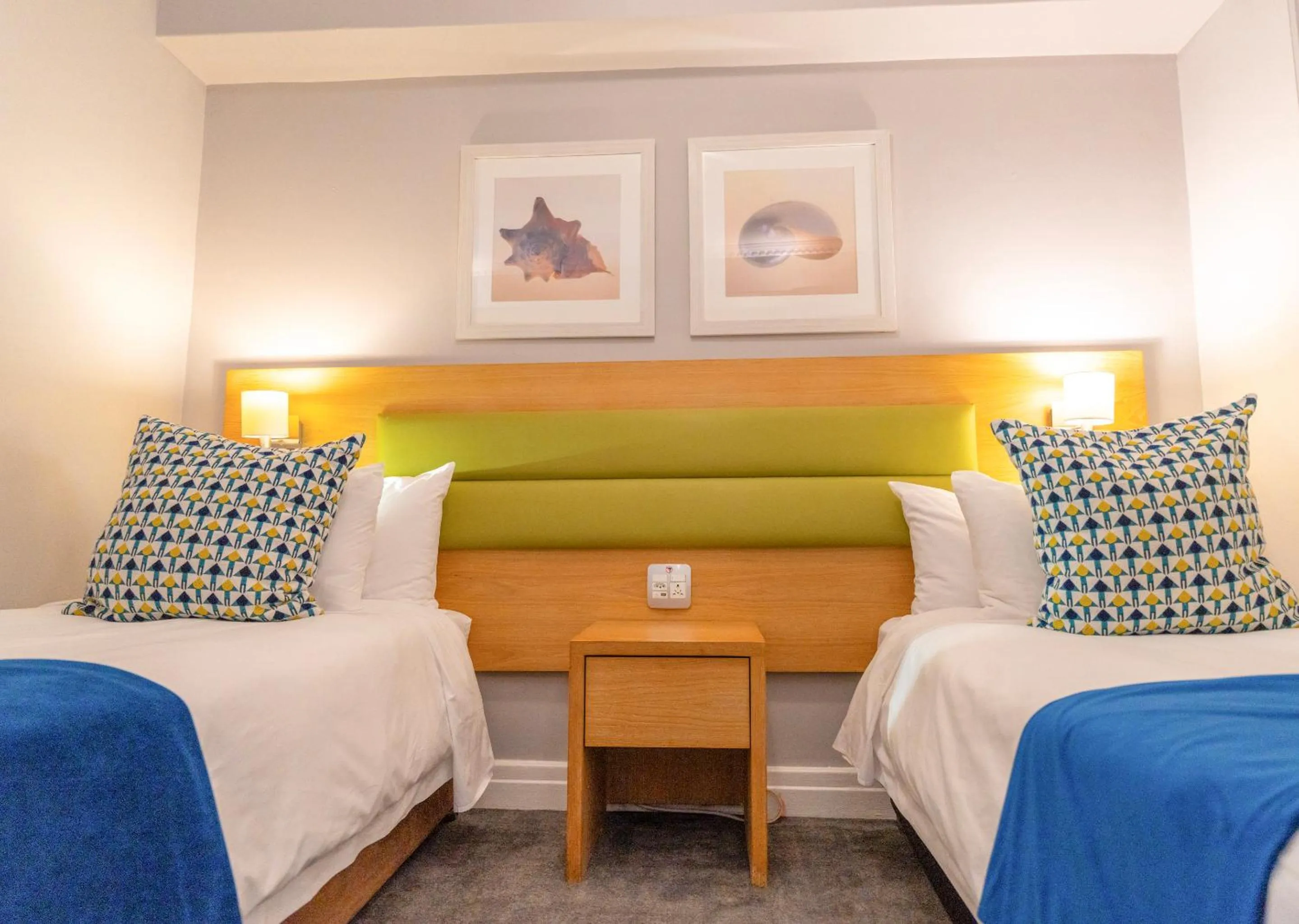 Bed in Peninsula All Suite Hotel by Dream Resorts