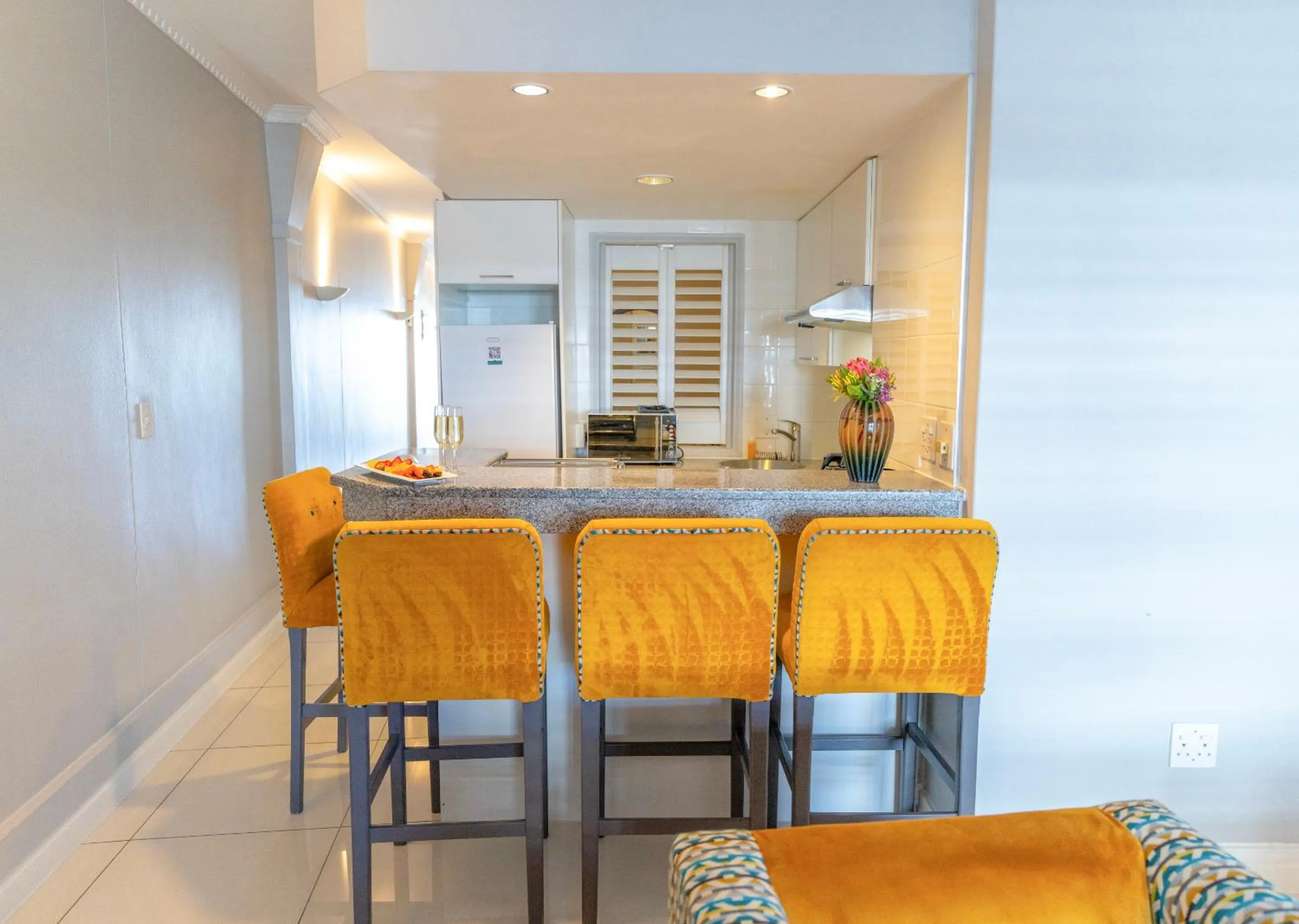 Kitchen or kitchenette in Peninsula All Suite Hotel by Dream Resorts