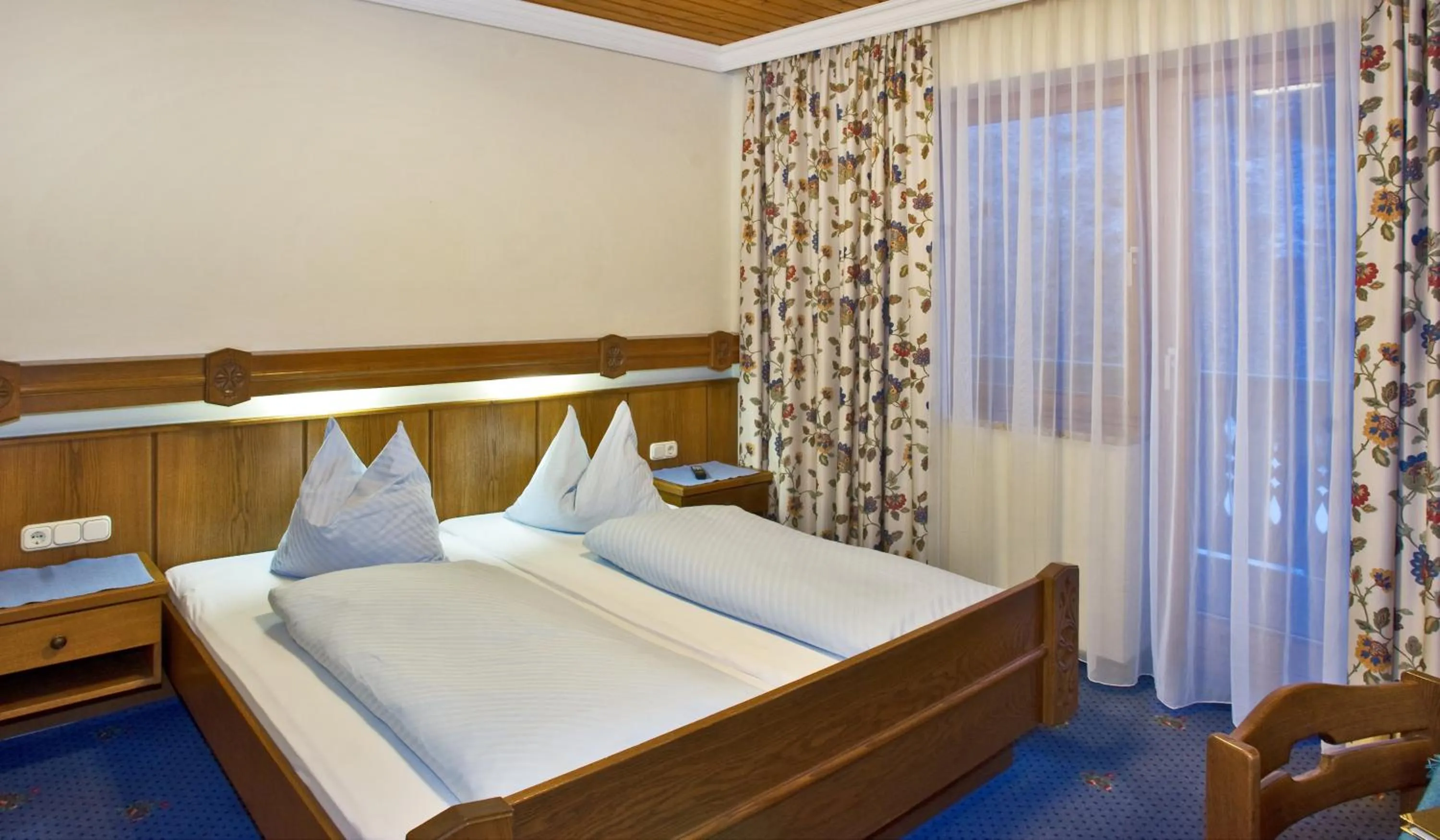 Bed in Hotel Berghof