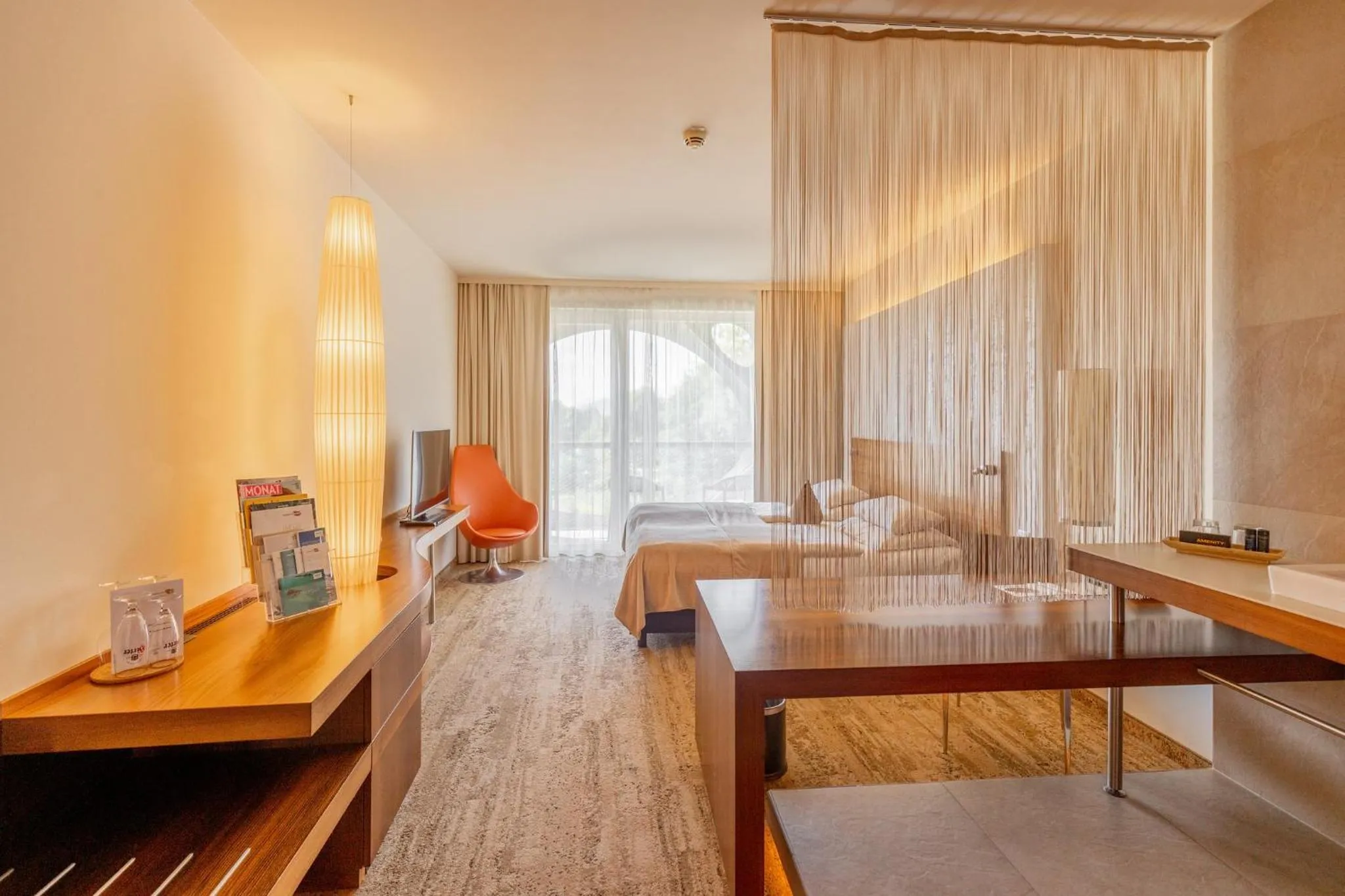 Photo of the whole room, Bed in Das Seepark Wörthersee Resort