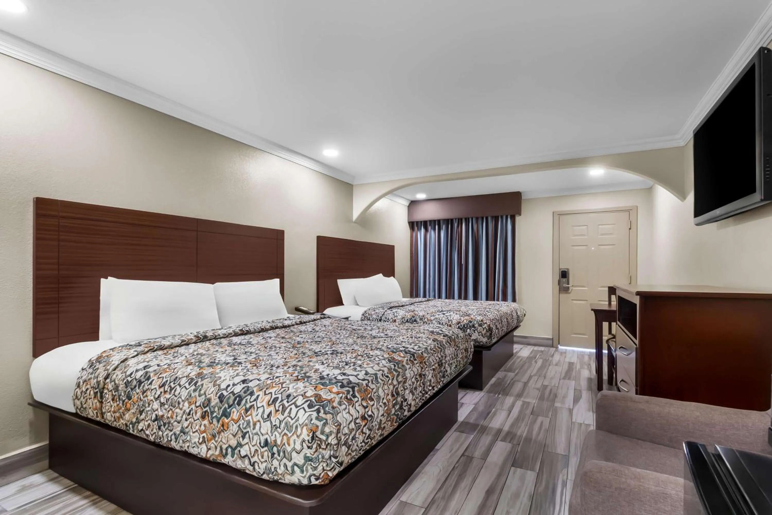 Bedroom, Bed in Americas Best Value Inn Houston Heights at I-45