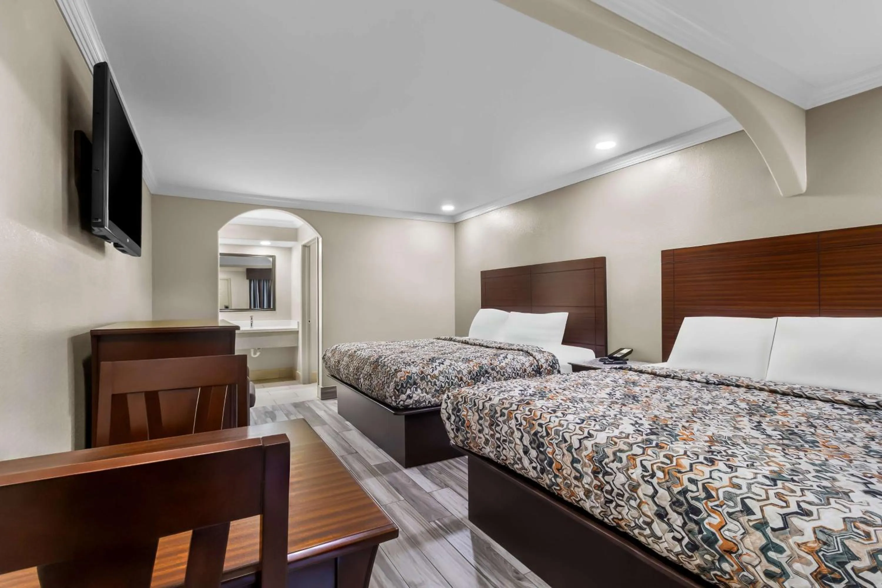 Bedroom, Bed in Americas Best Value Inn Houston Heights at I-45