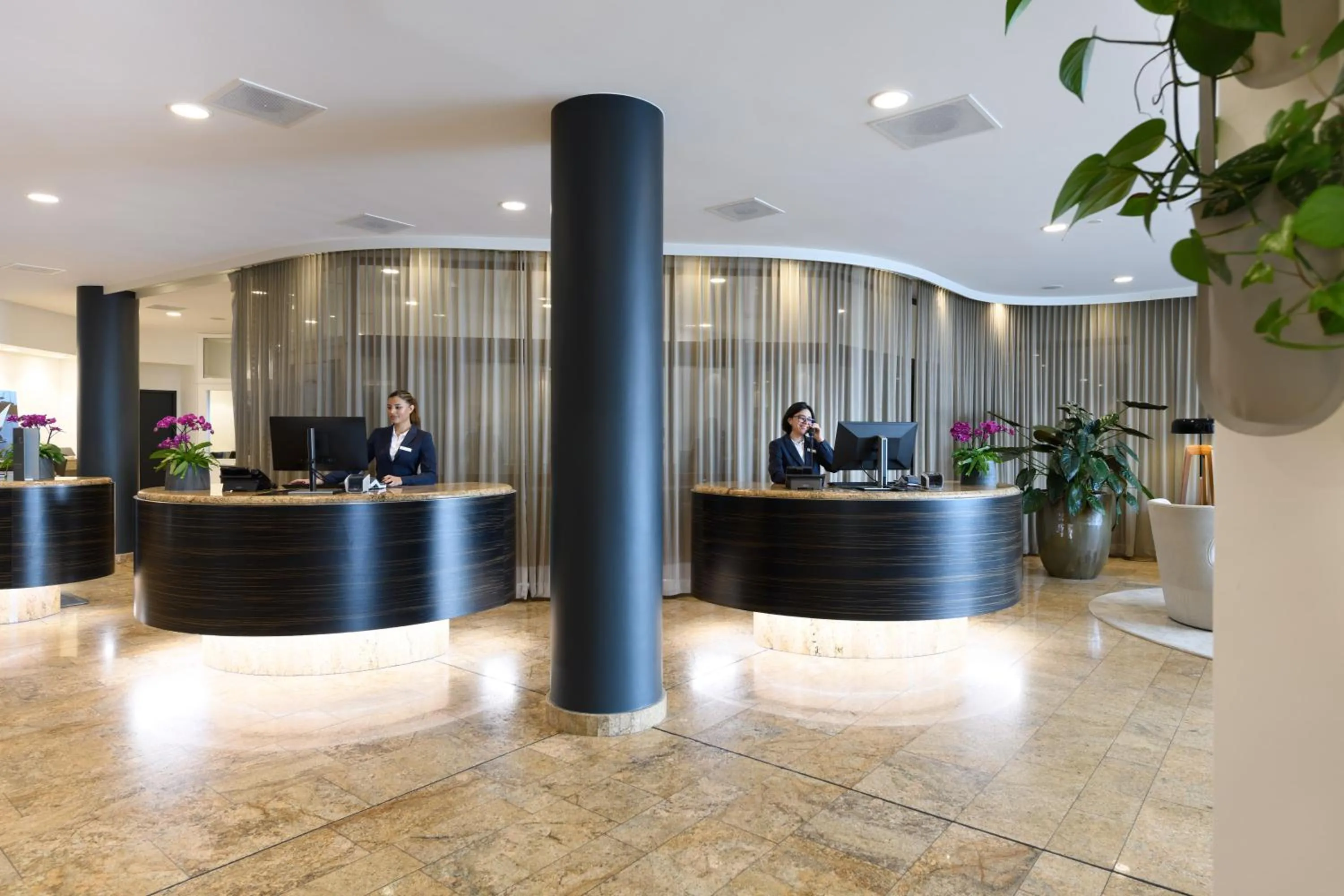 Lobby or reception in Mövenpick Hotel Lausanne
