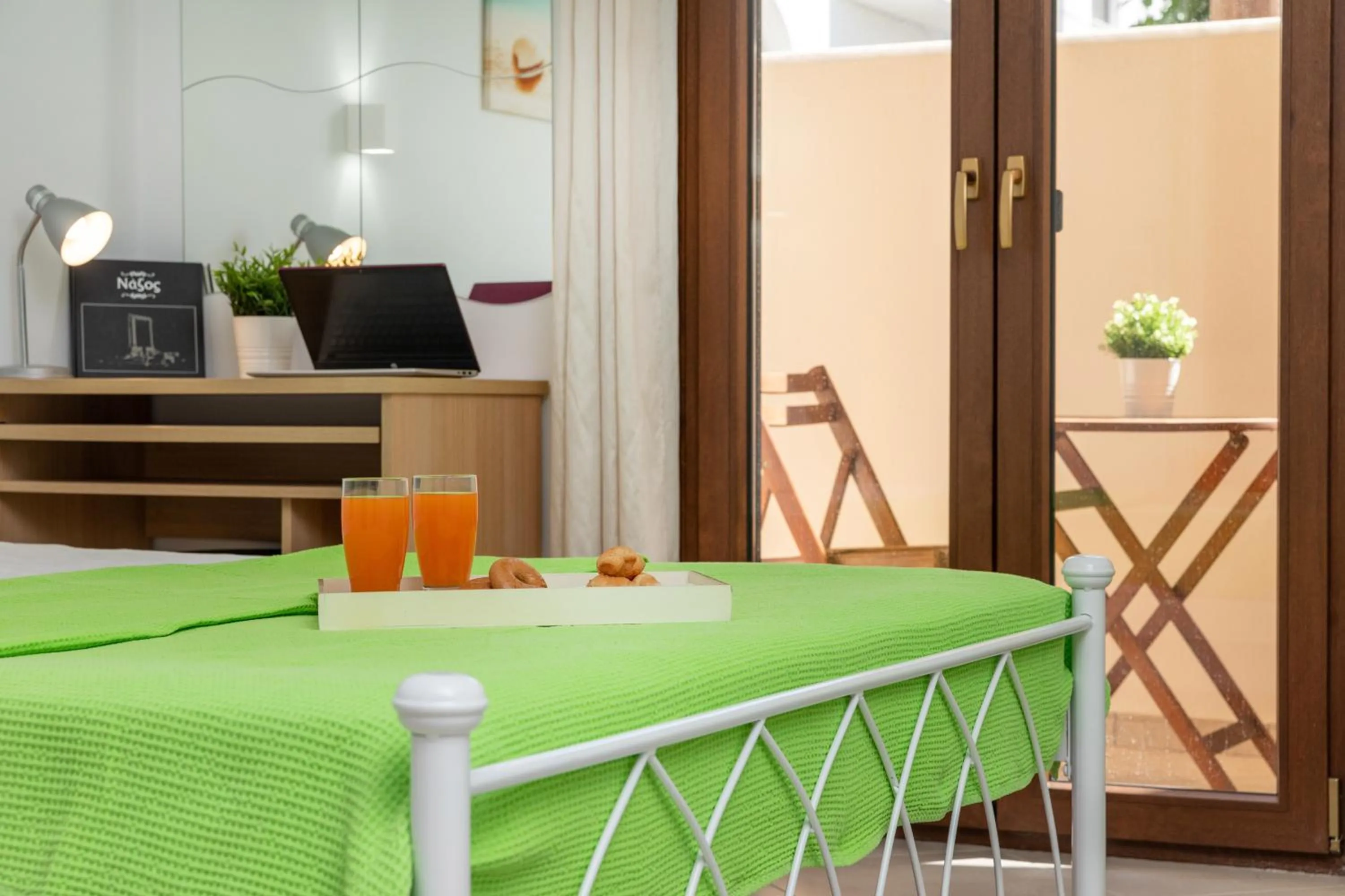 Bed in NAXOS DIAMOND Studios Apartments