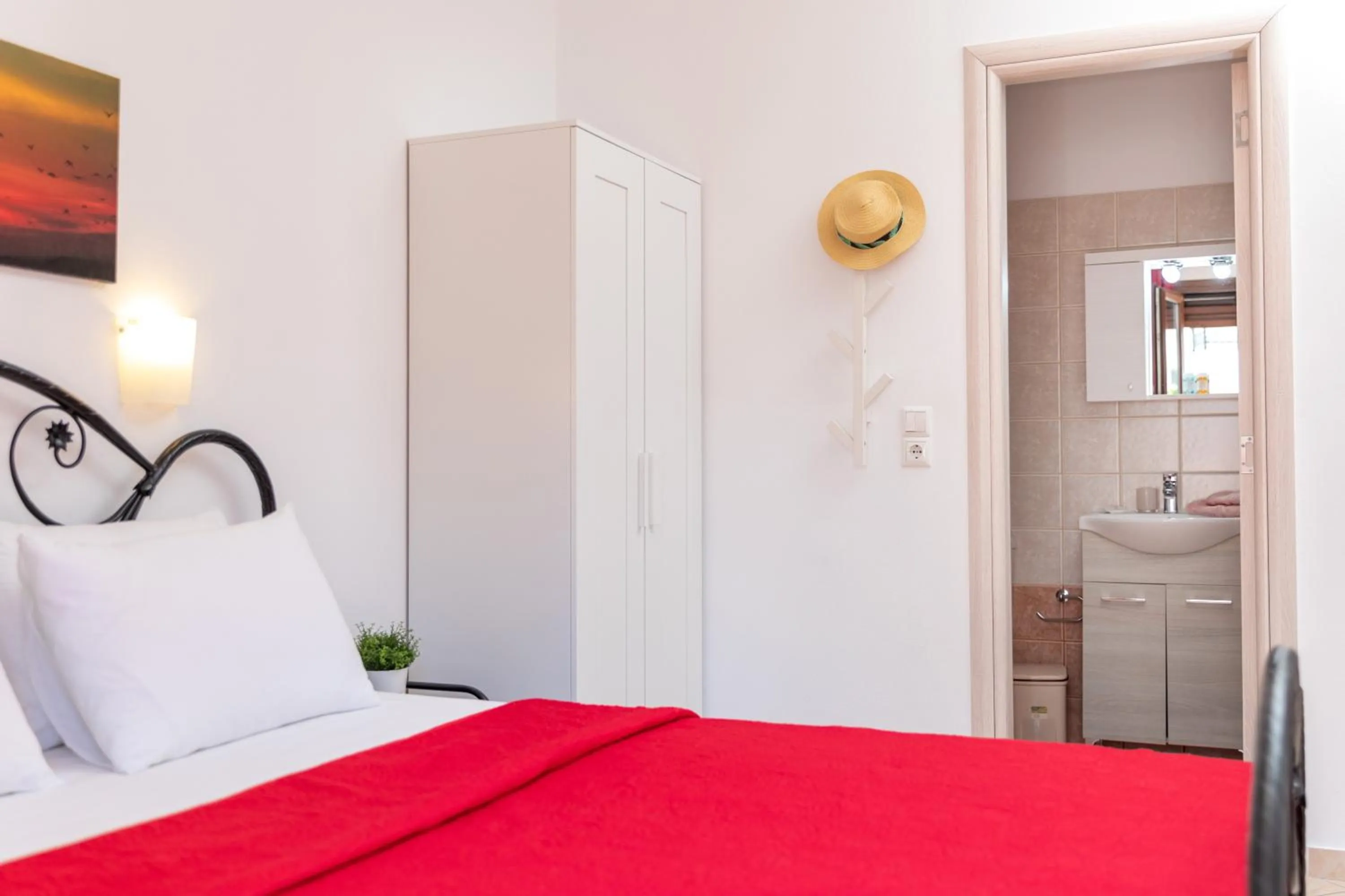 Bed in NAXOS DIAMOND Studios Apartments