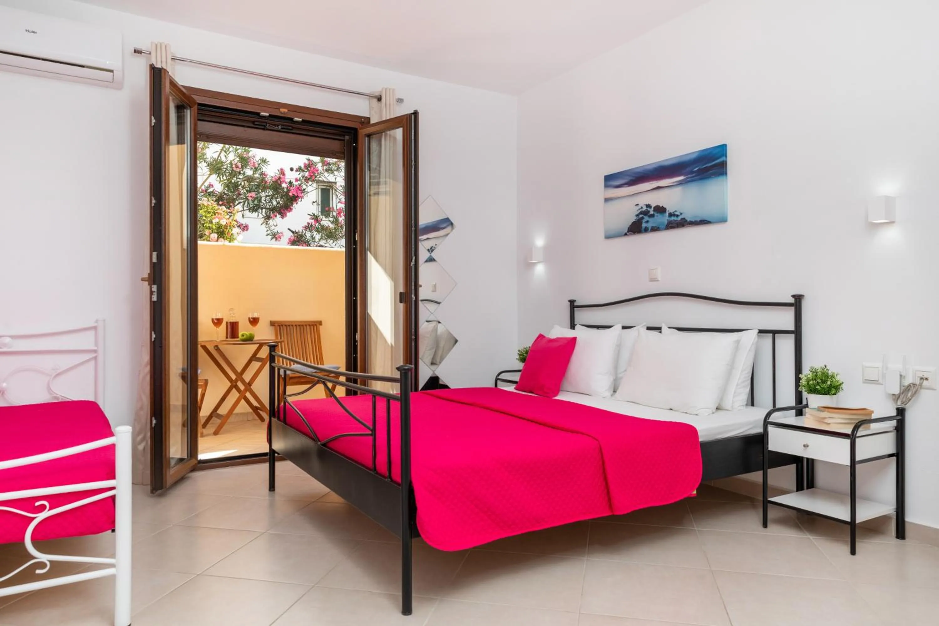 Bed in NAXOS DIAMOND Studios Apartments