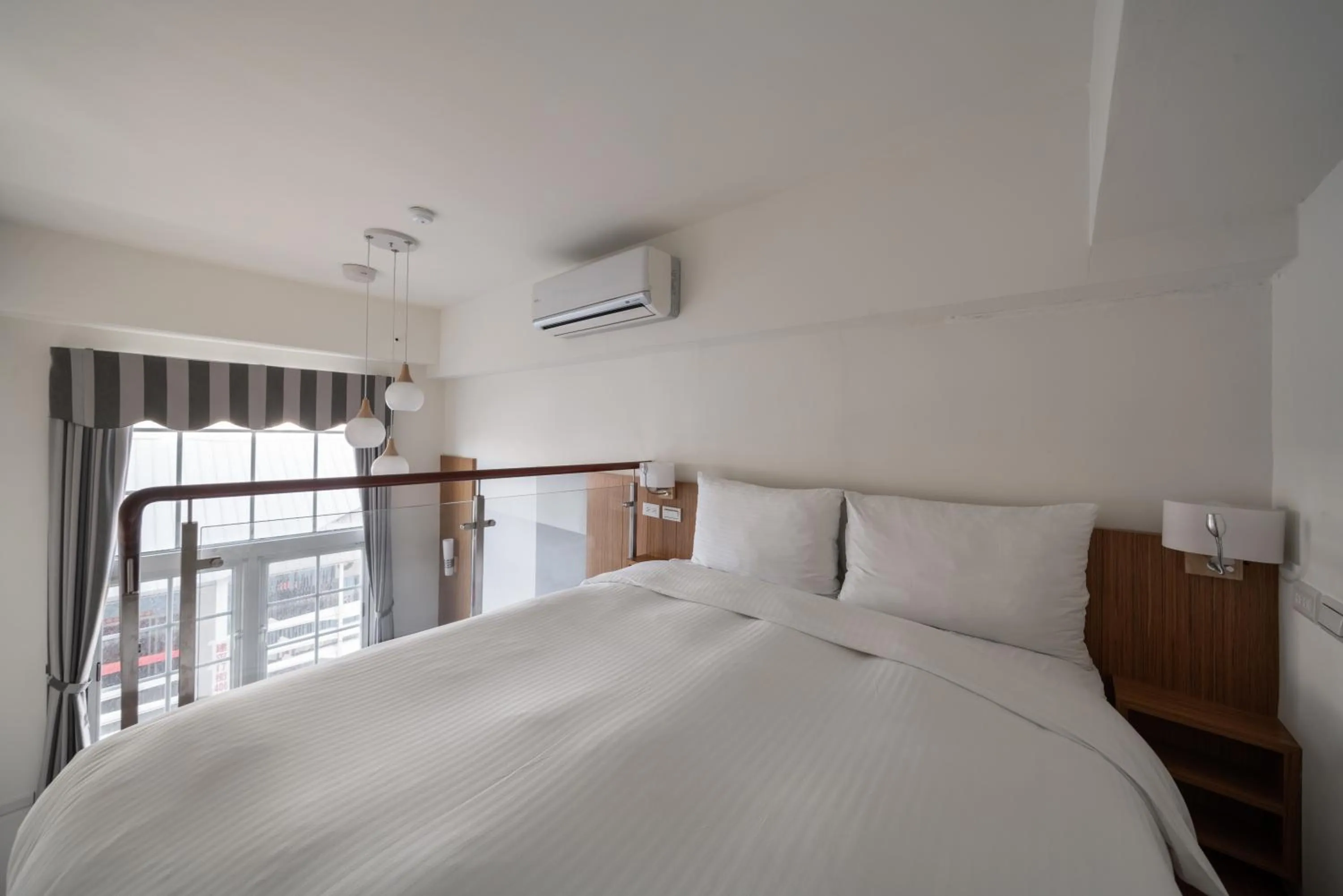 Bed in Anping Kensington Hotel