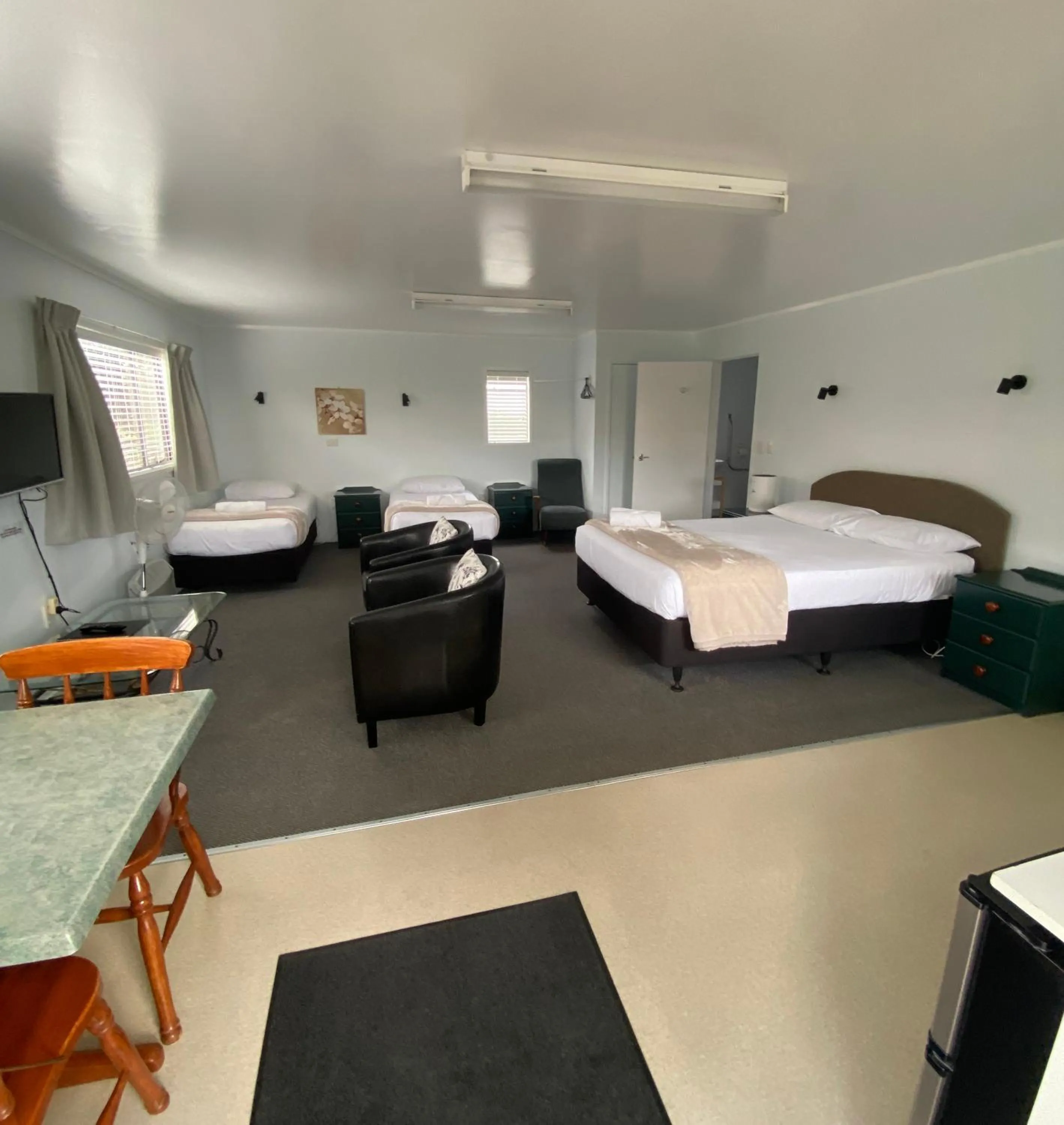 Bed in Opononi Lighthouse Motel