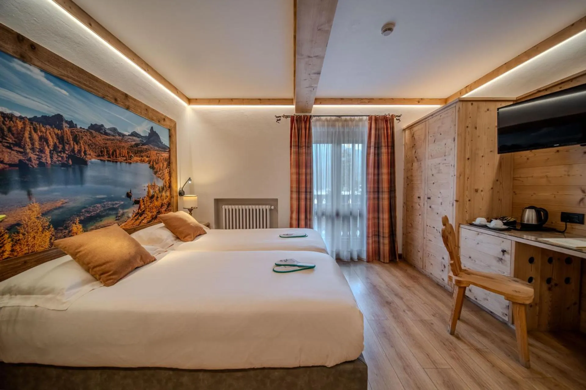 Bed in Hotel Panda Cortina- ricarica auto elettriche