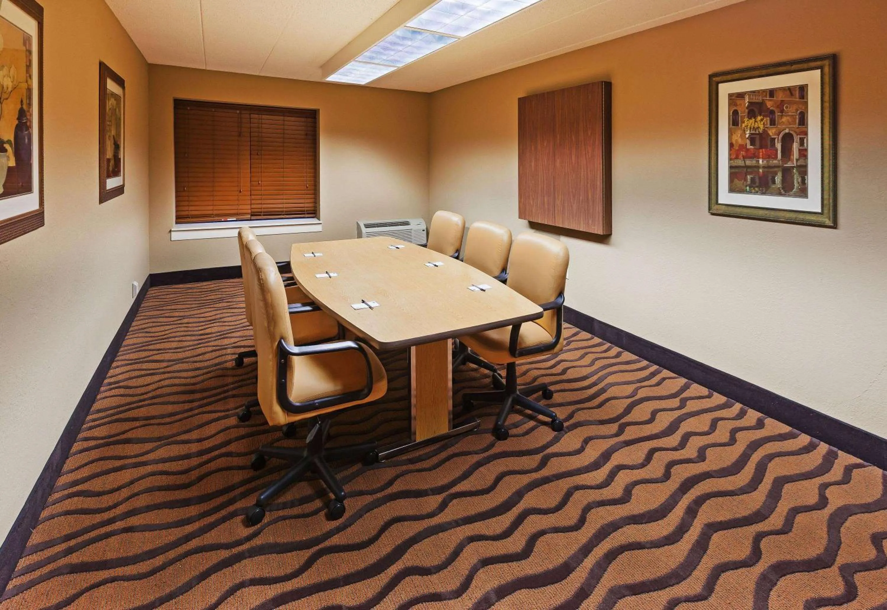 Meeting/conference room in AmericInn by Wyndham Omaha