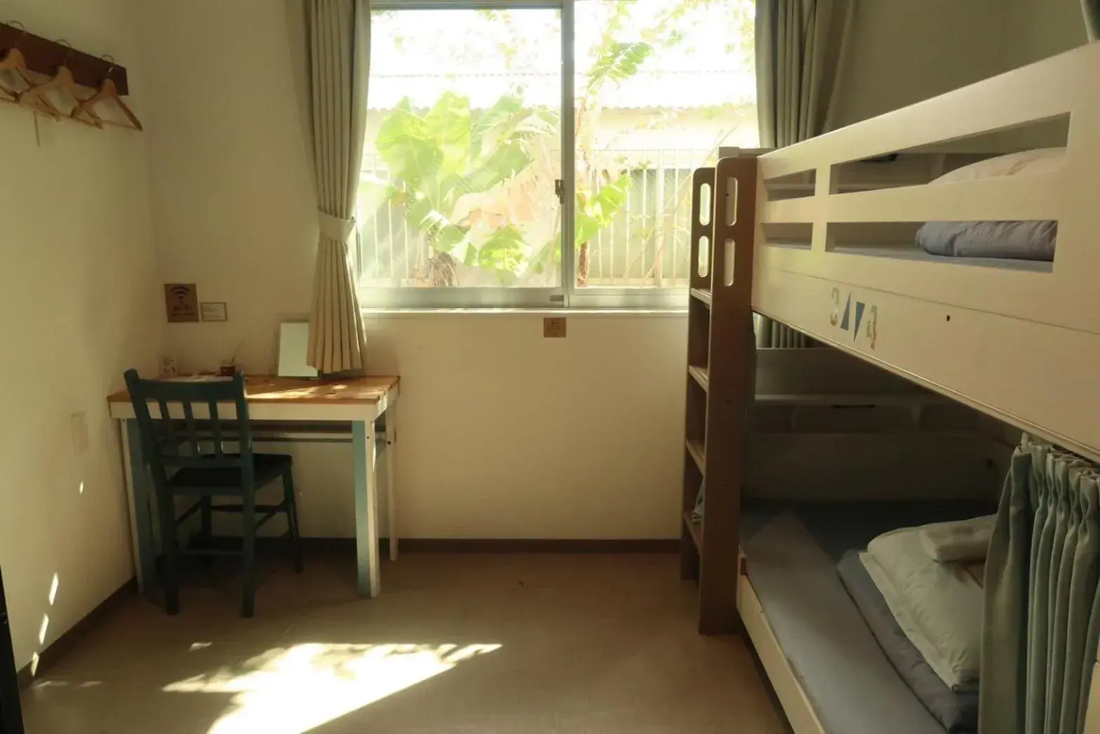 Bunk Bed in Female Dormitory Room in HOSTEL SunTerrace Ishigaki Bunk Bed in Female Dormitory Room in HOSTEL SunTerrace Ishigaki