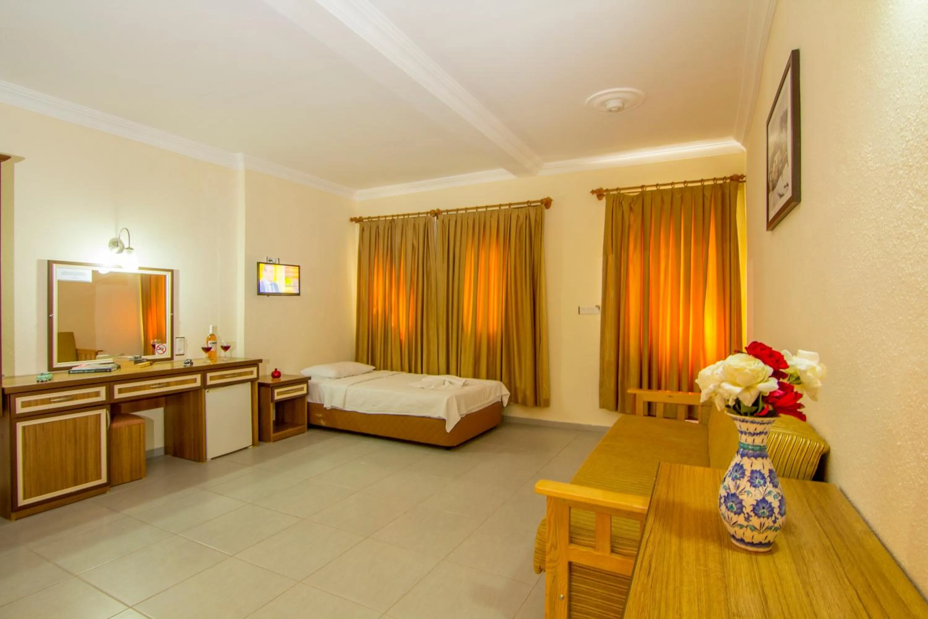 Seating area, Bed in Hotel Karbel Sun