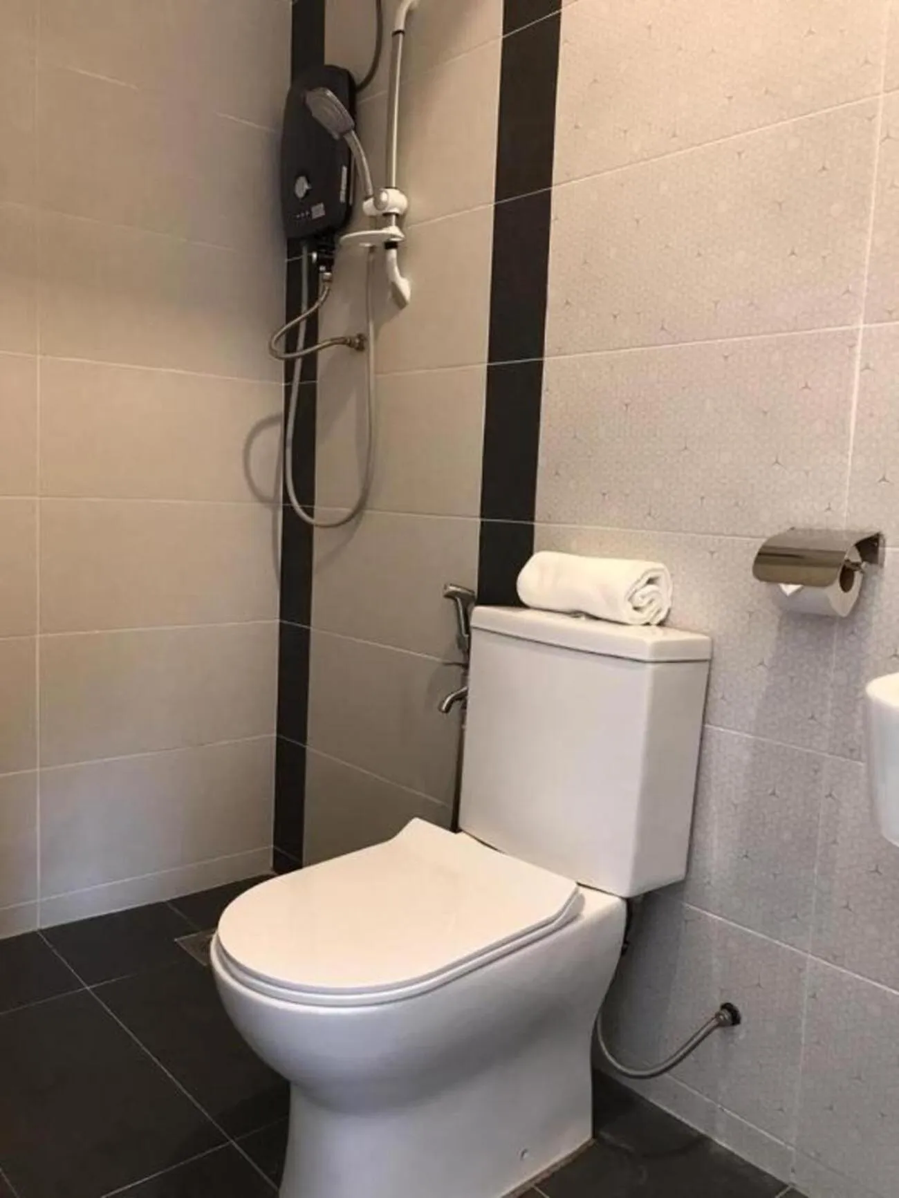 Toilet in TT Dorf Hotel Matang