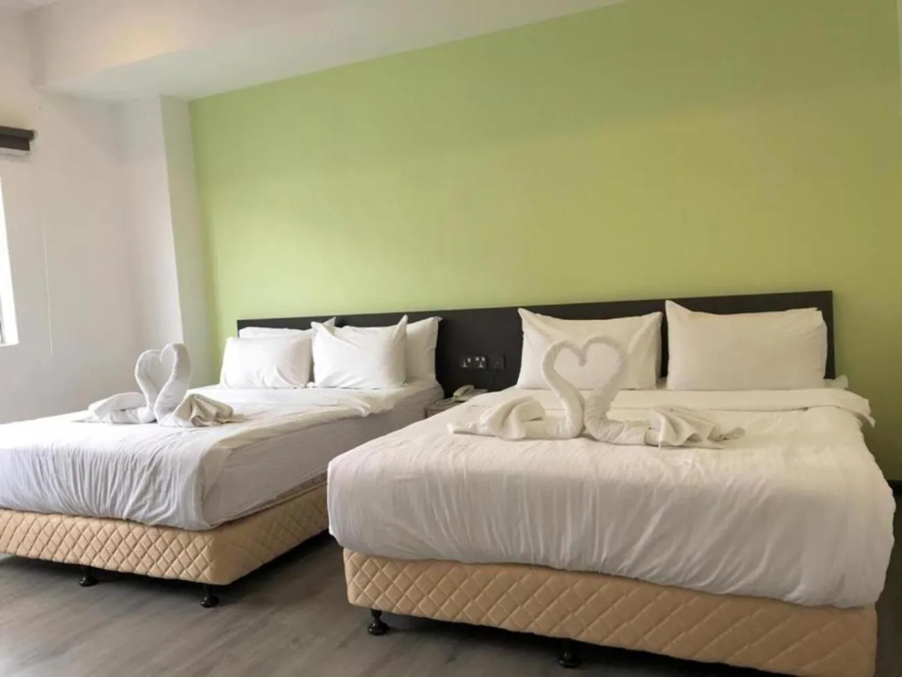 Photo of the whole room, Bed in TT Dorf Hotel Matang