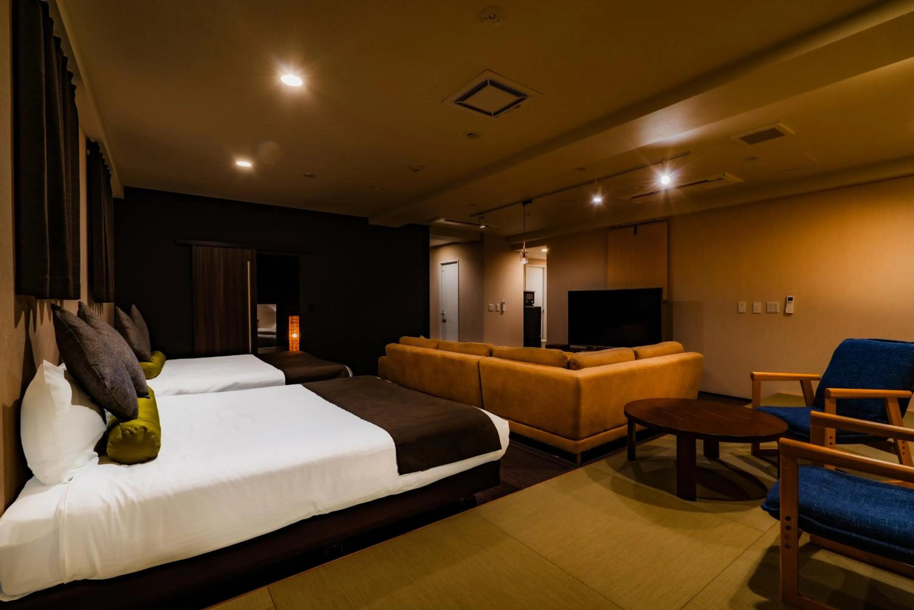 Photo of the whole room, Bed in Randor Residence Susukino Suites
