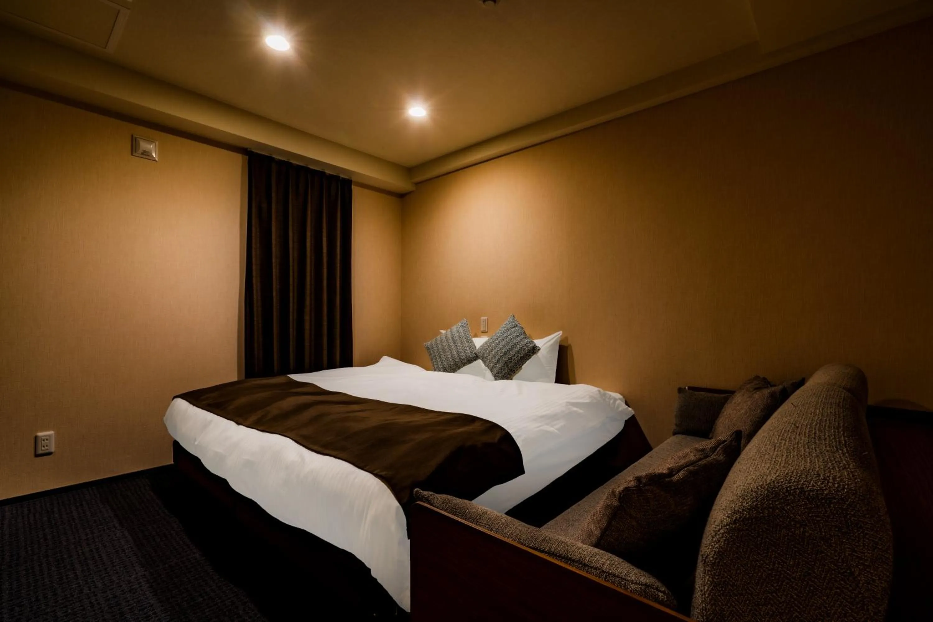 Bedroom, Bed in Randor Residence Susukino Suites