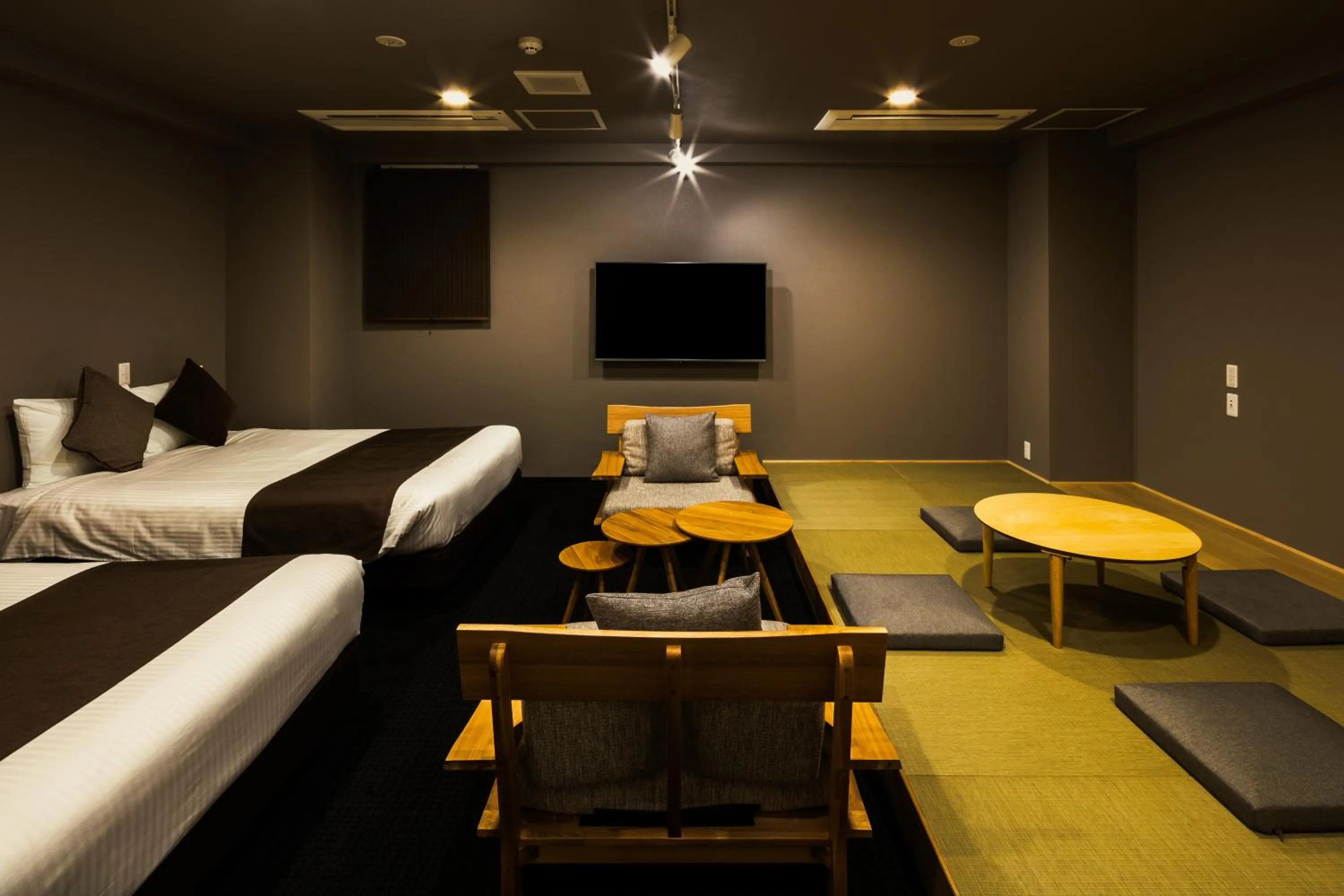 Living room, Bed in Randor Residence Susukino Suites