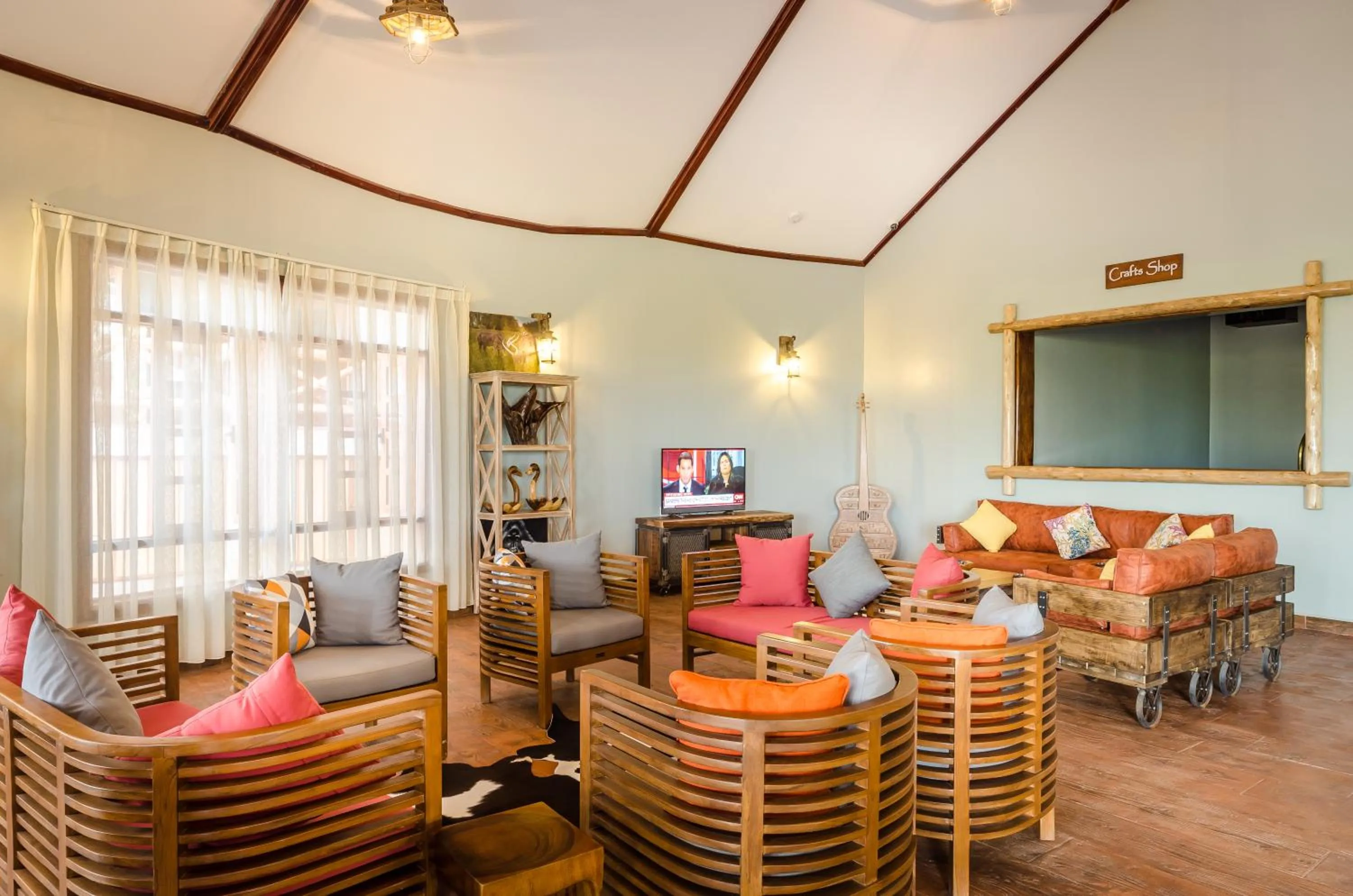 Communal lounge/ TV room in Emburara Farm Lodge
