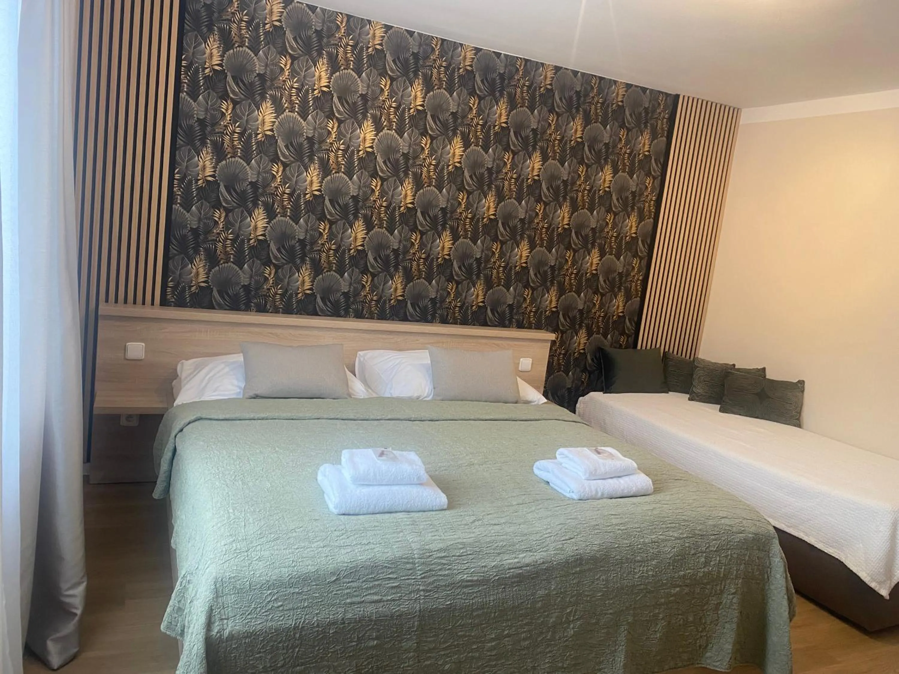 Bed in STING Apartments Havířov