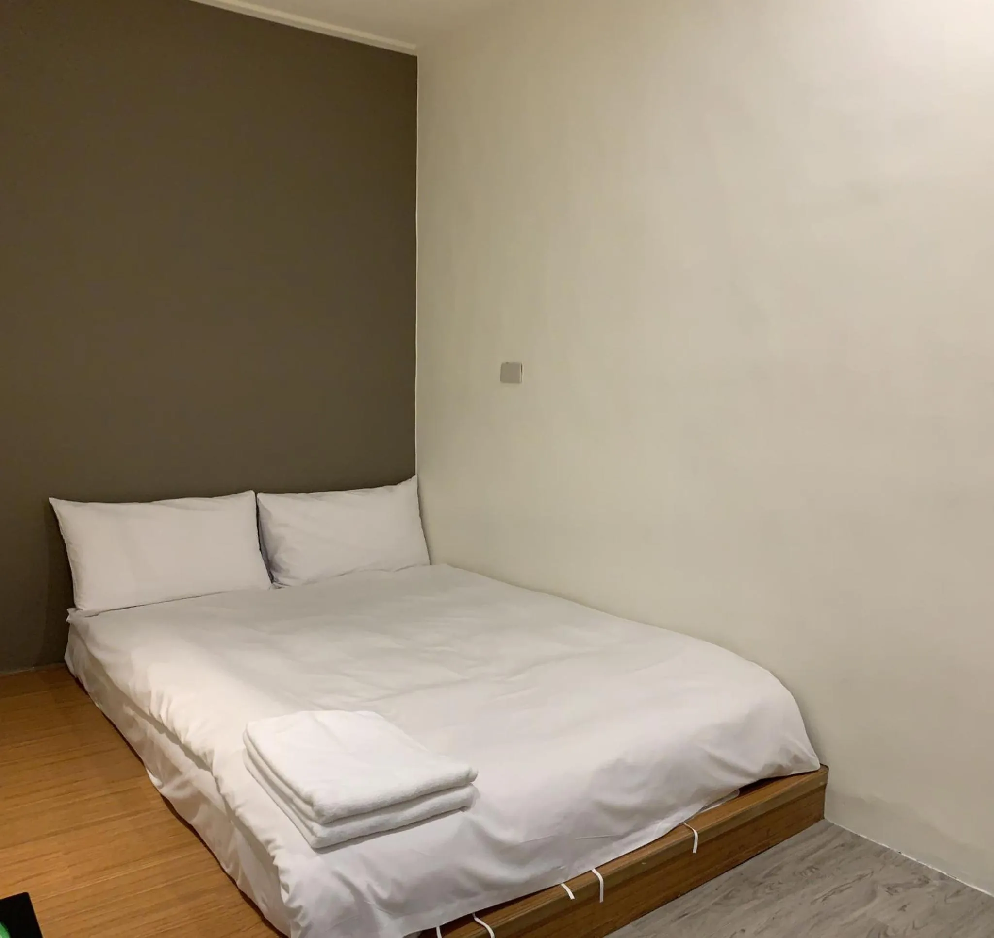 Bed in Raise Hotel Taichung