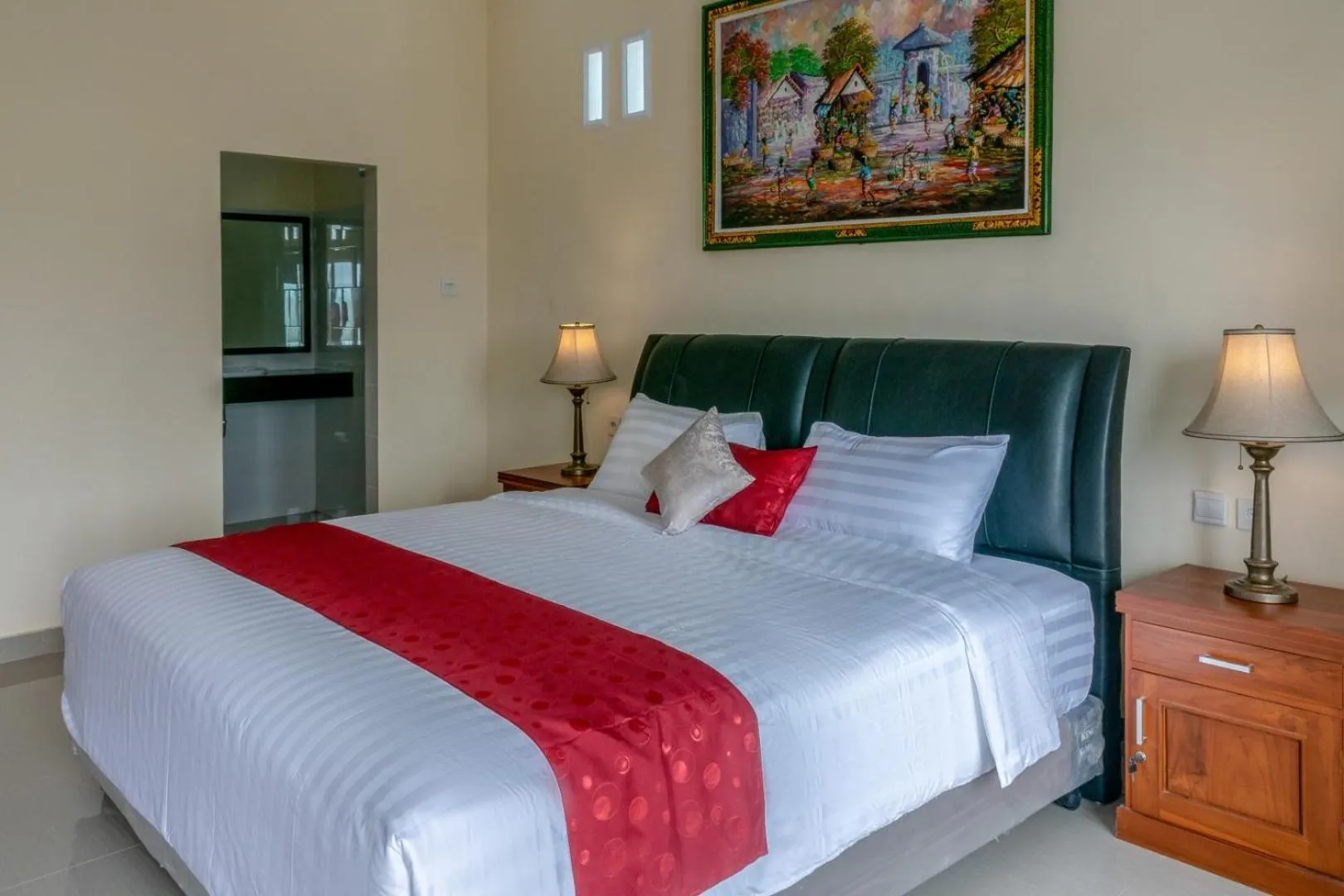 Bed in Adhi Jaya Suite