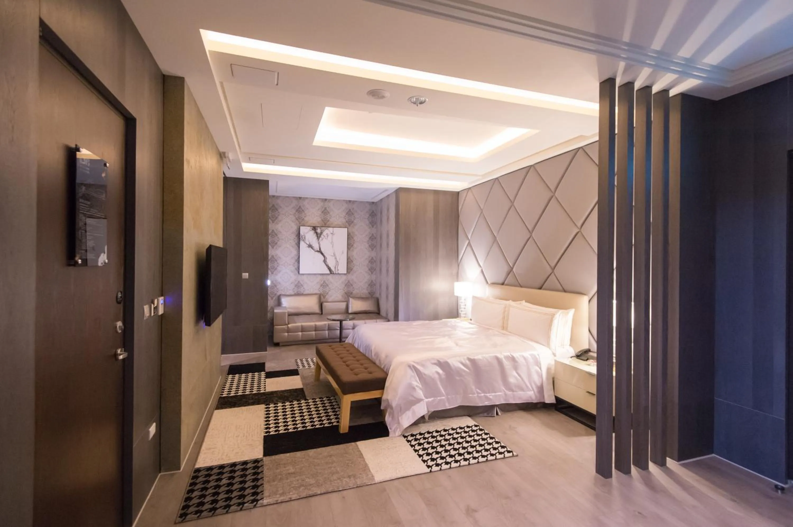 Bed in J Moon Villa Motel