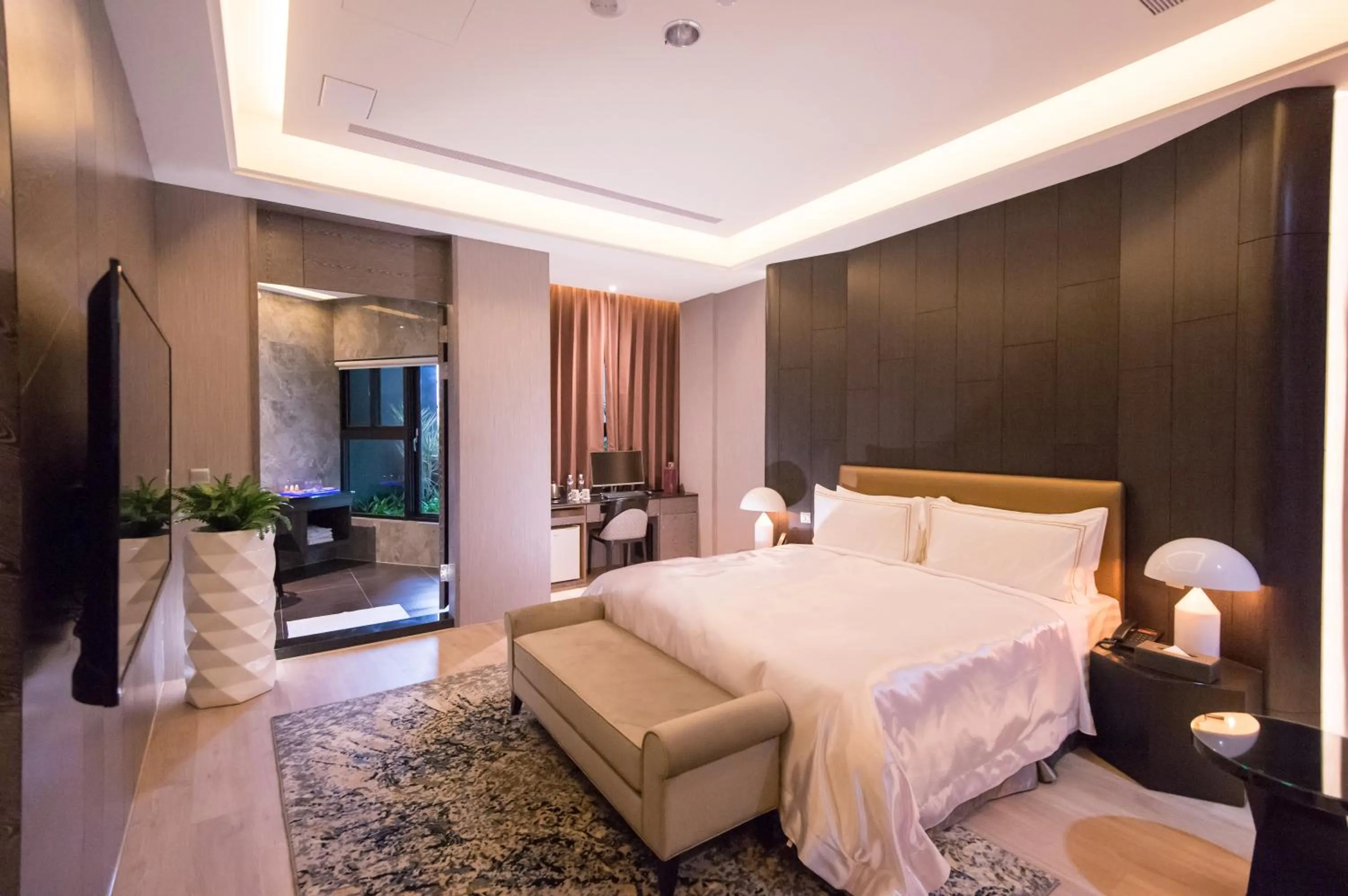 Bed in J Moon Villa Motel