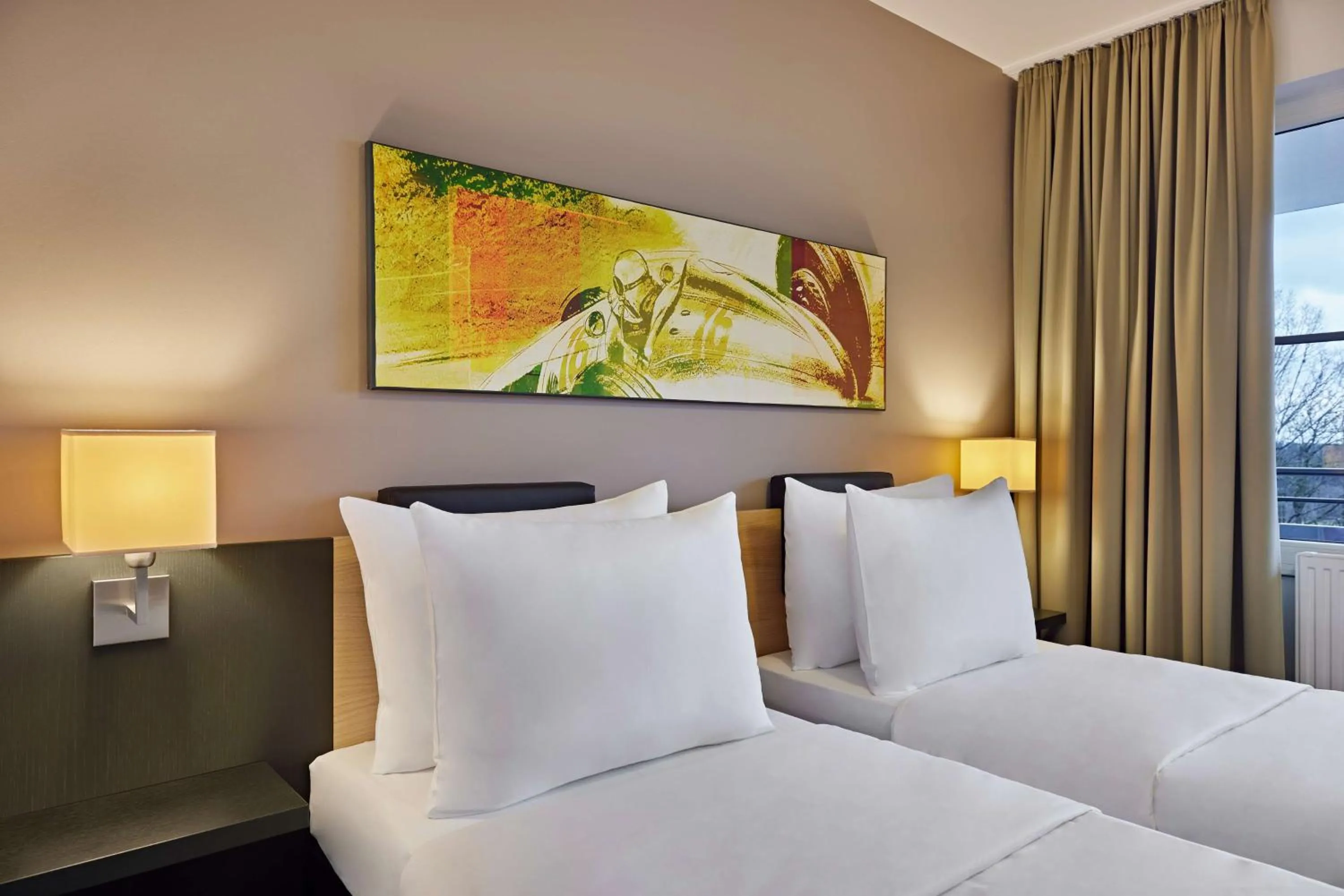 Photo of the whole room, Bed in Nürburgring Motorsport Hotel