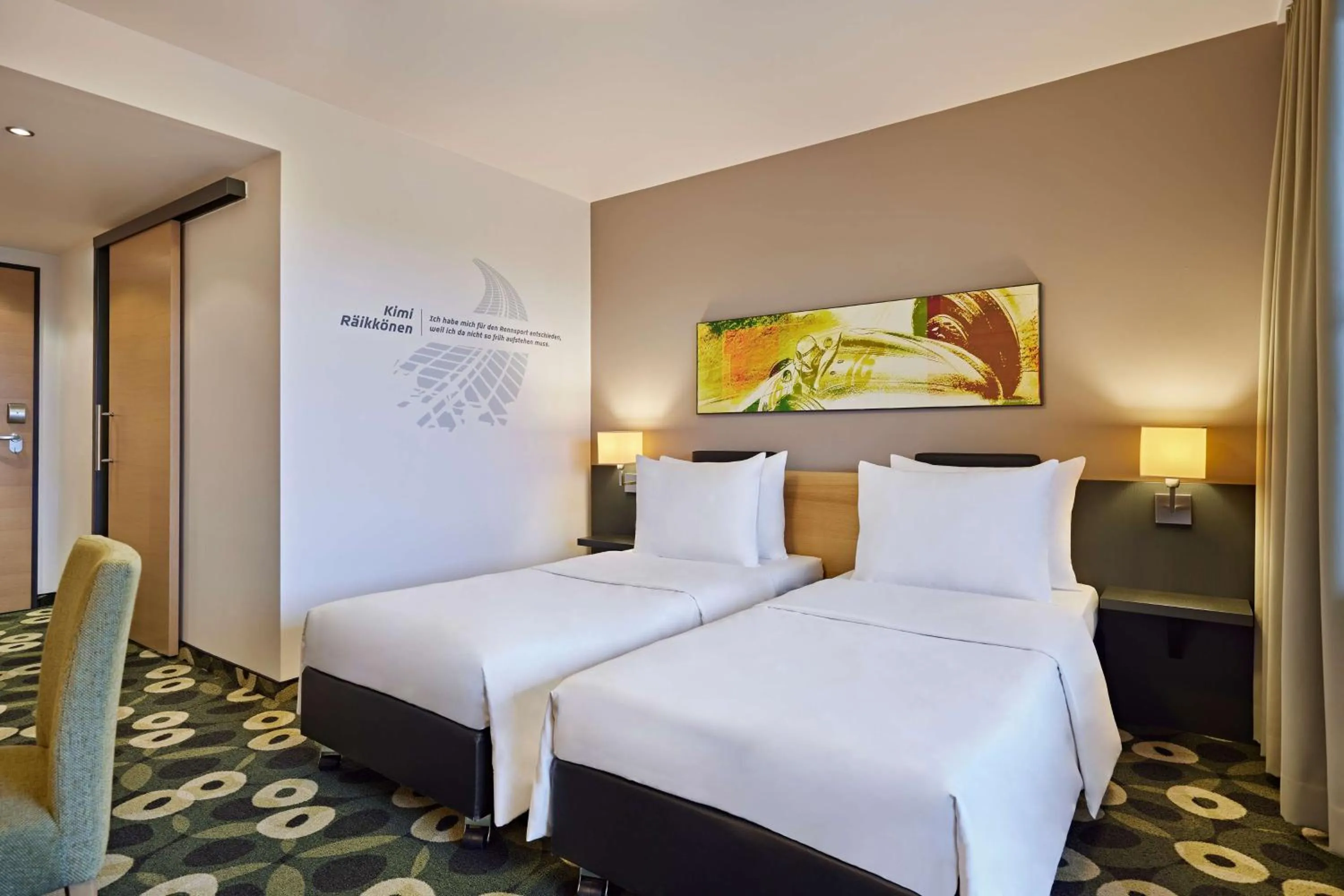 Photo of the whole room, Bed in Nürburgring Motorsport Hotel