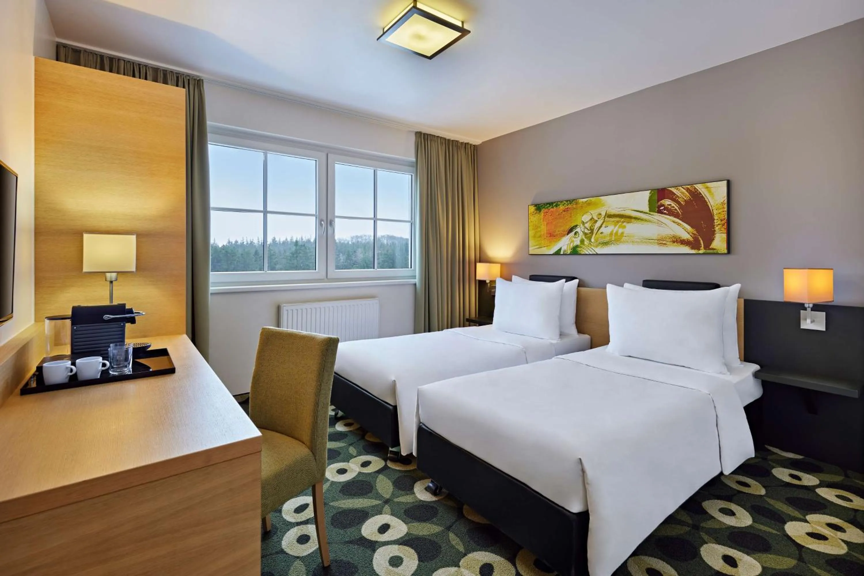 Photo of the whole room, Bed in Nürburgring Motorsport Hotel