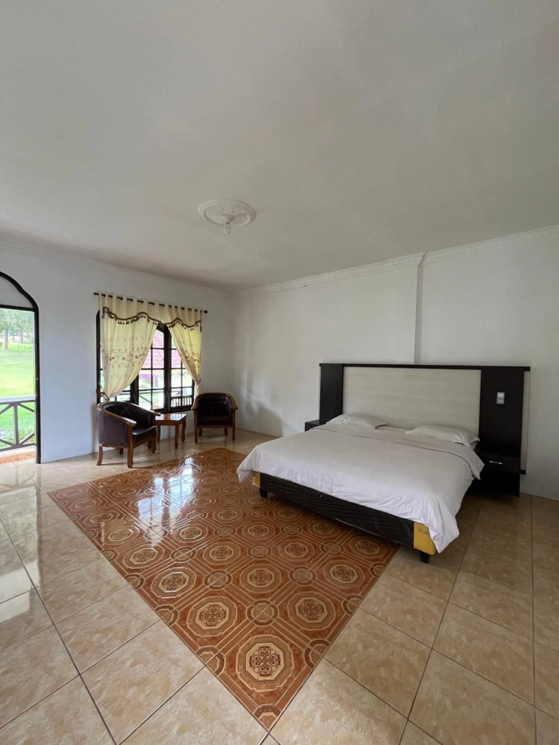 Bed in Sibayak Multinational Rest House