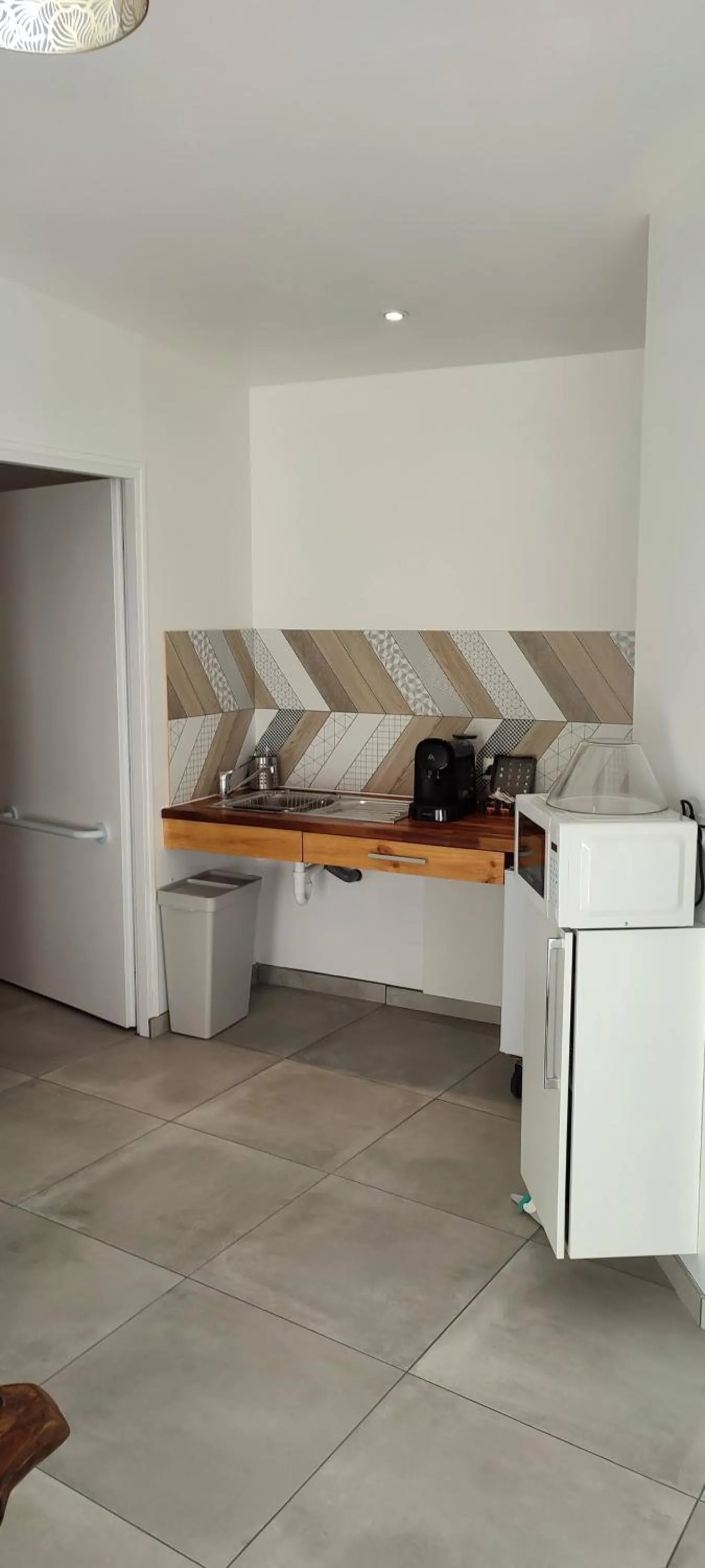 Kitchen or kitchenette in Mauguio Center Hôtel