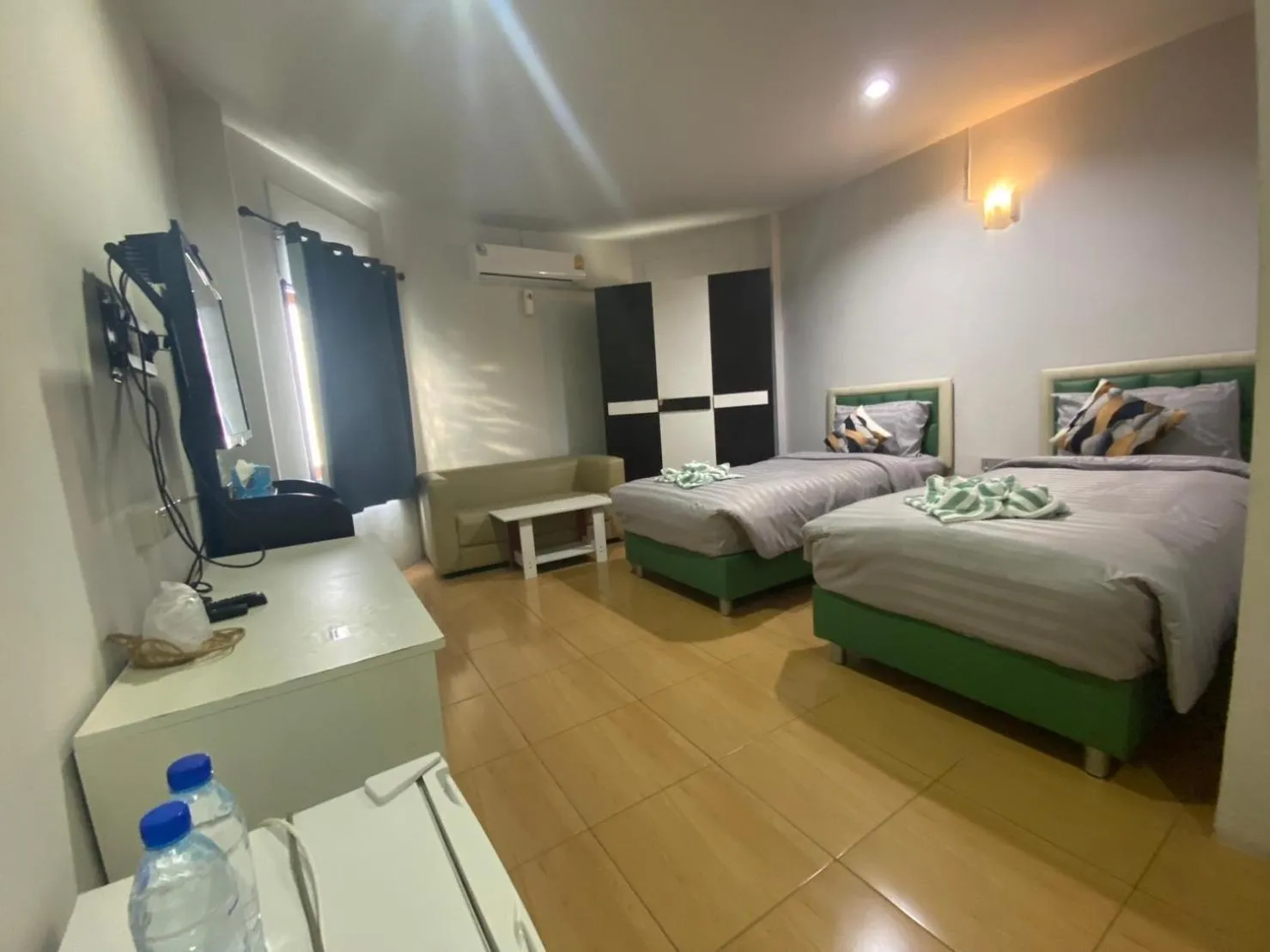 Bed in Alongkorn hotel by SB