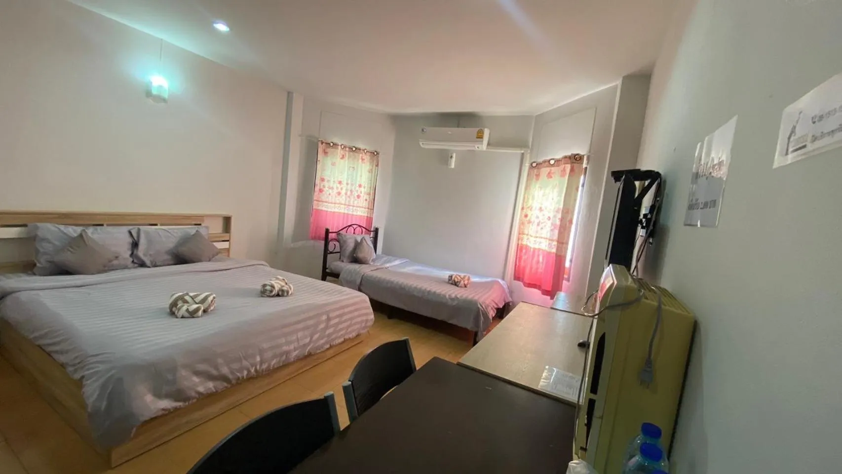 Bed in Alongkorn hotel by SB