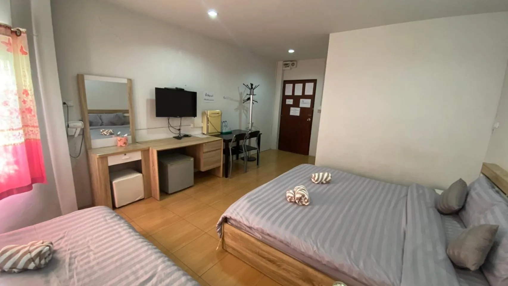 Bed in Alongkorn hotel by SB