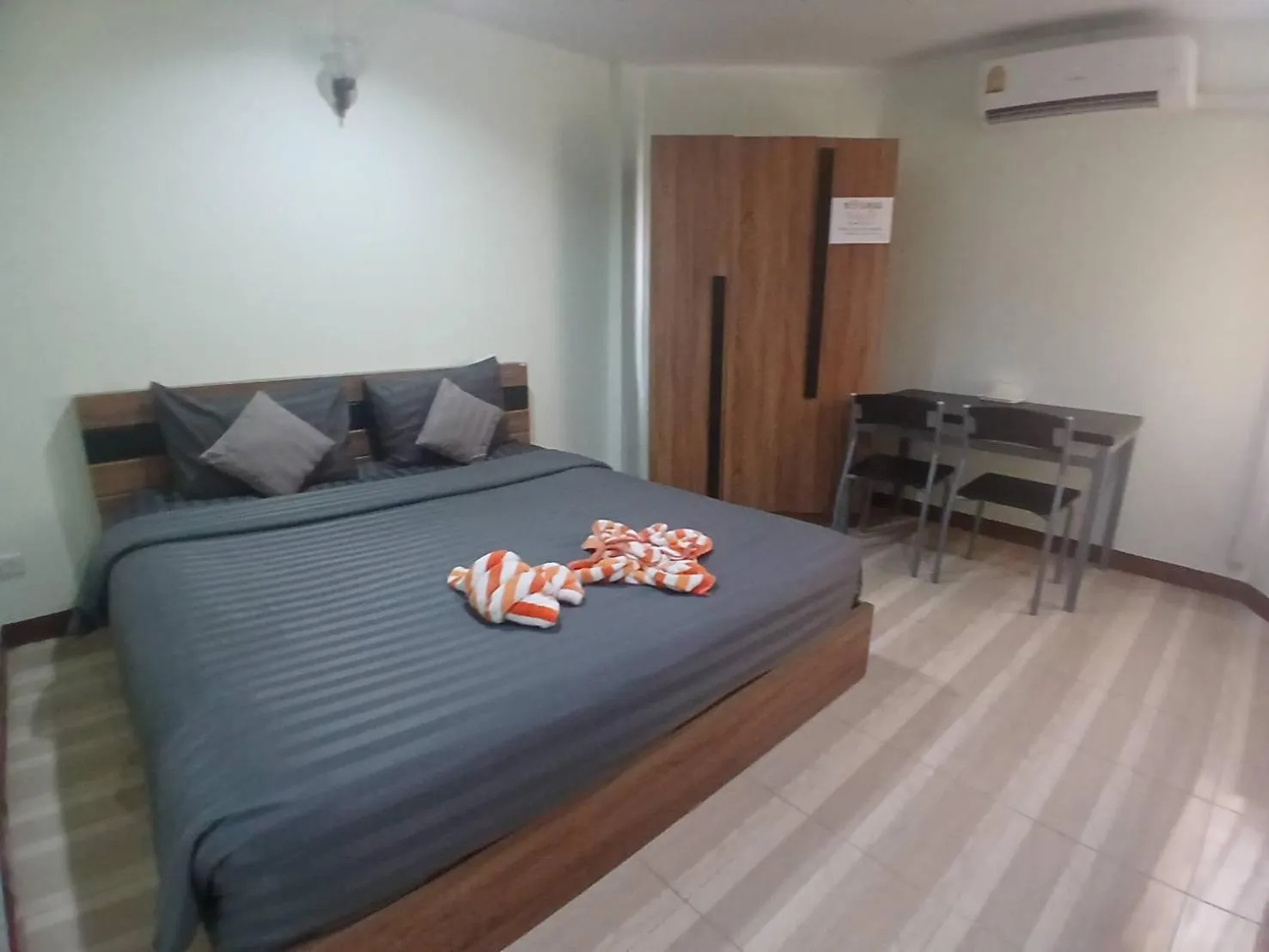 Bed in Alongkorn hotel by SB