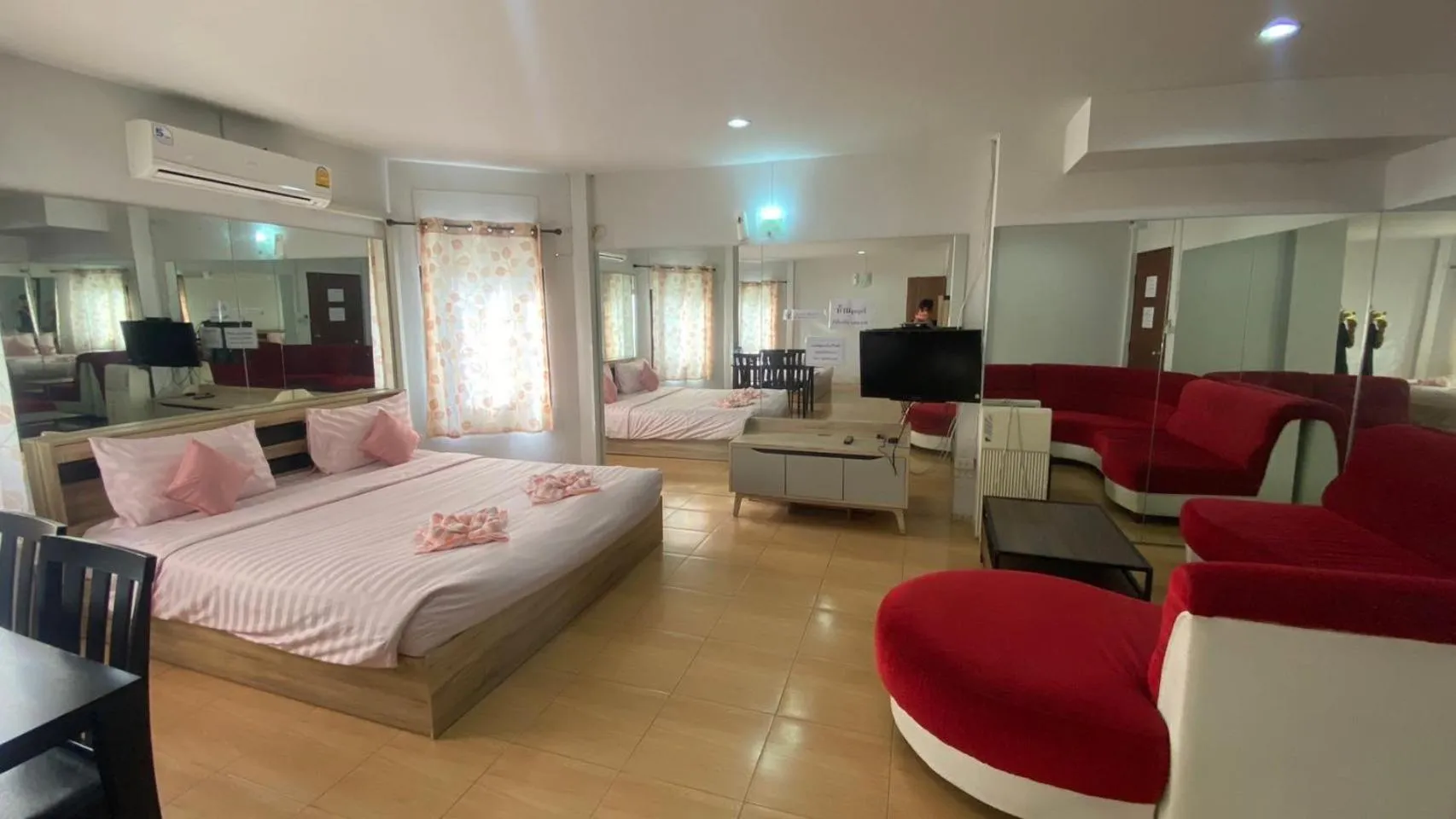 Bed in Alongkorn hotel by SB