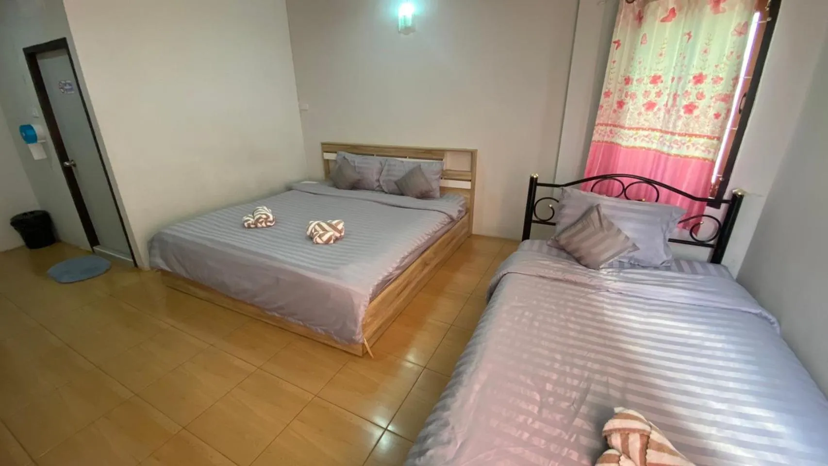 Bed in Alongkorn hotel by SB