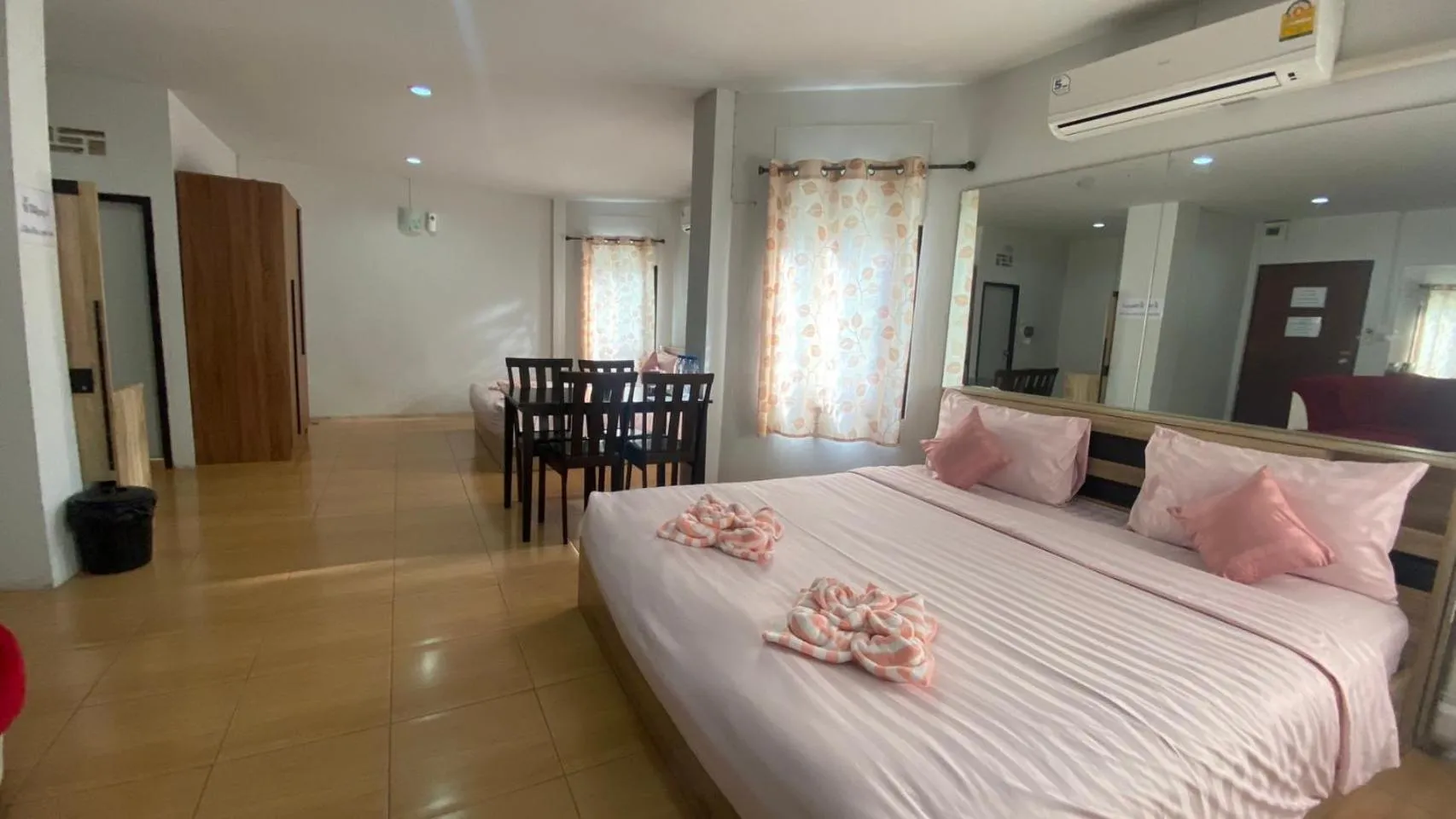 Bed in Alongkorn hotel by SB