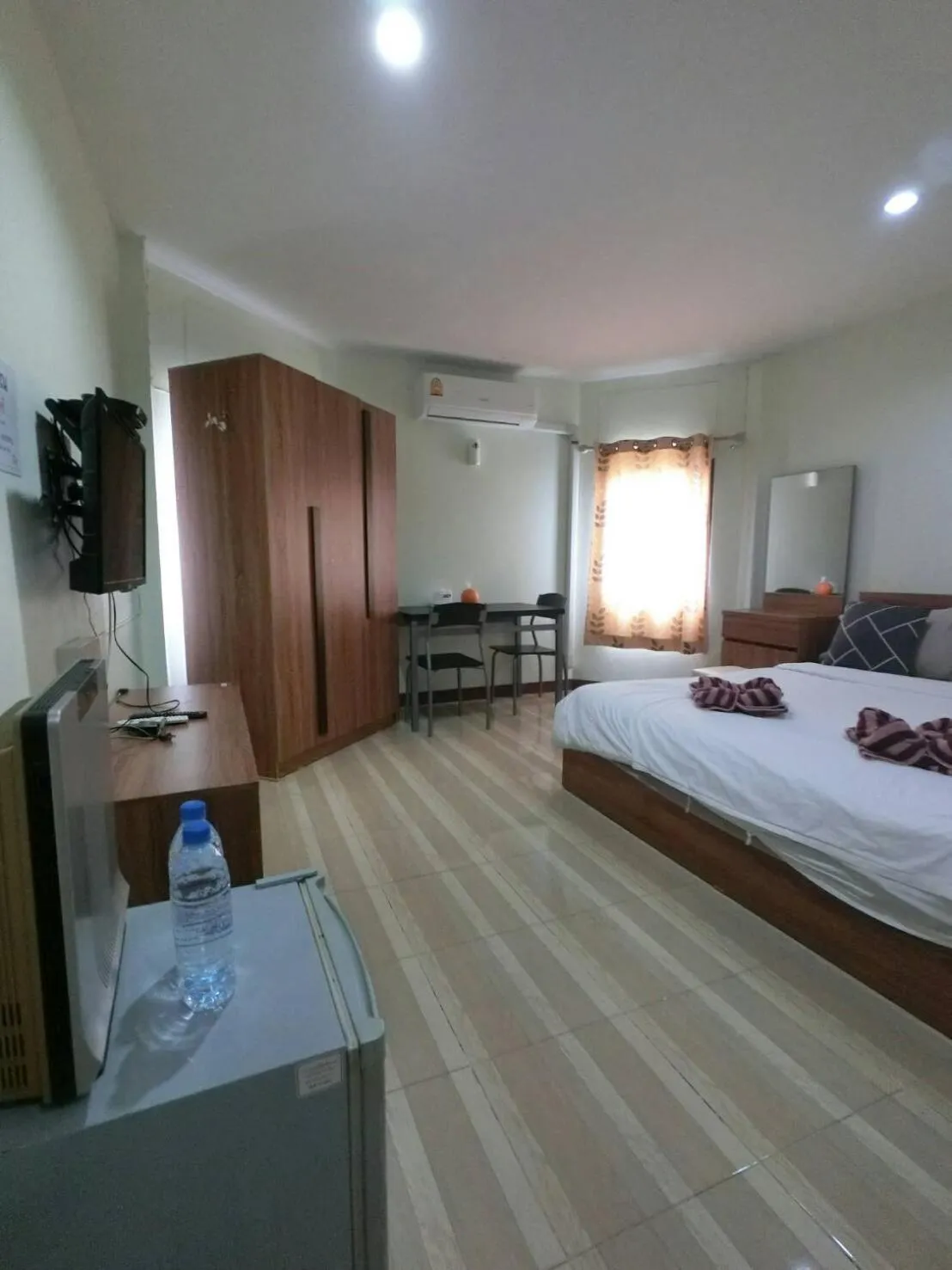 Bed in Alongkorn hotel by SB