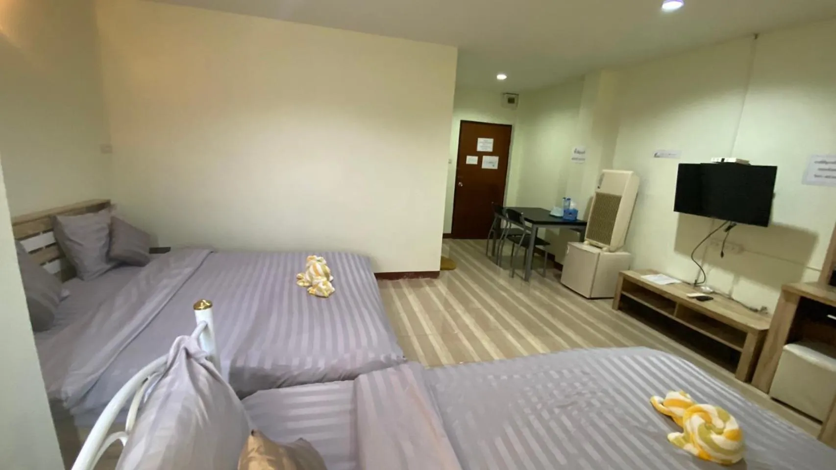 Bed in Alongkorn hotel by SB