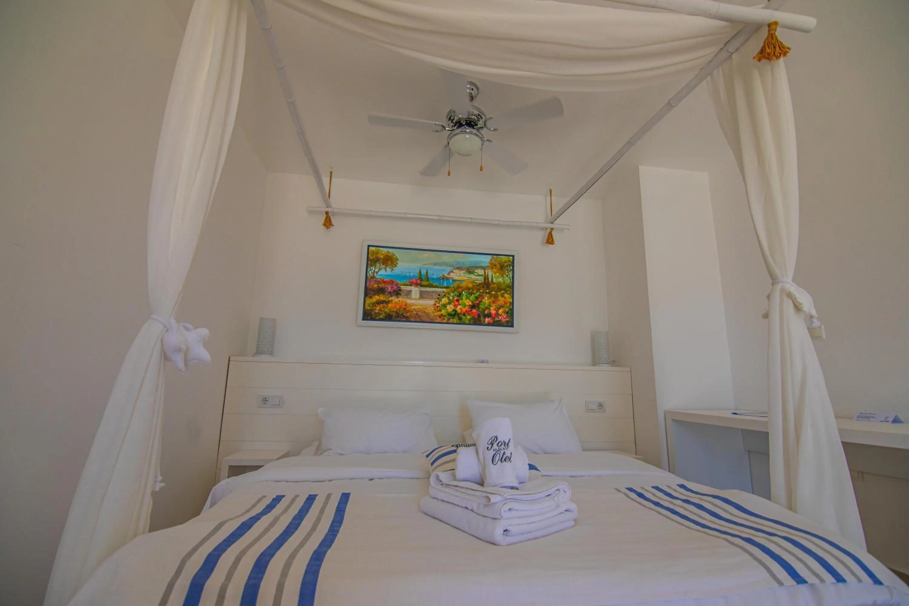 Bed in Port Alacati Hotel