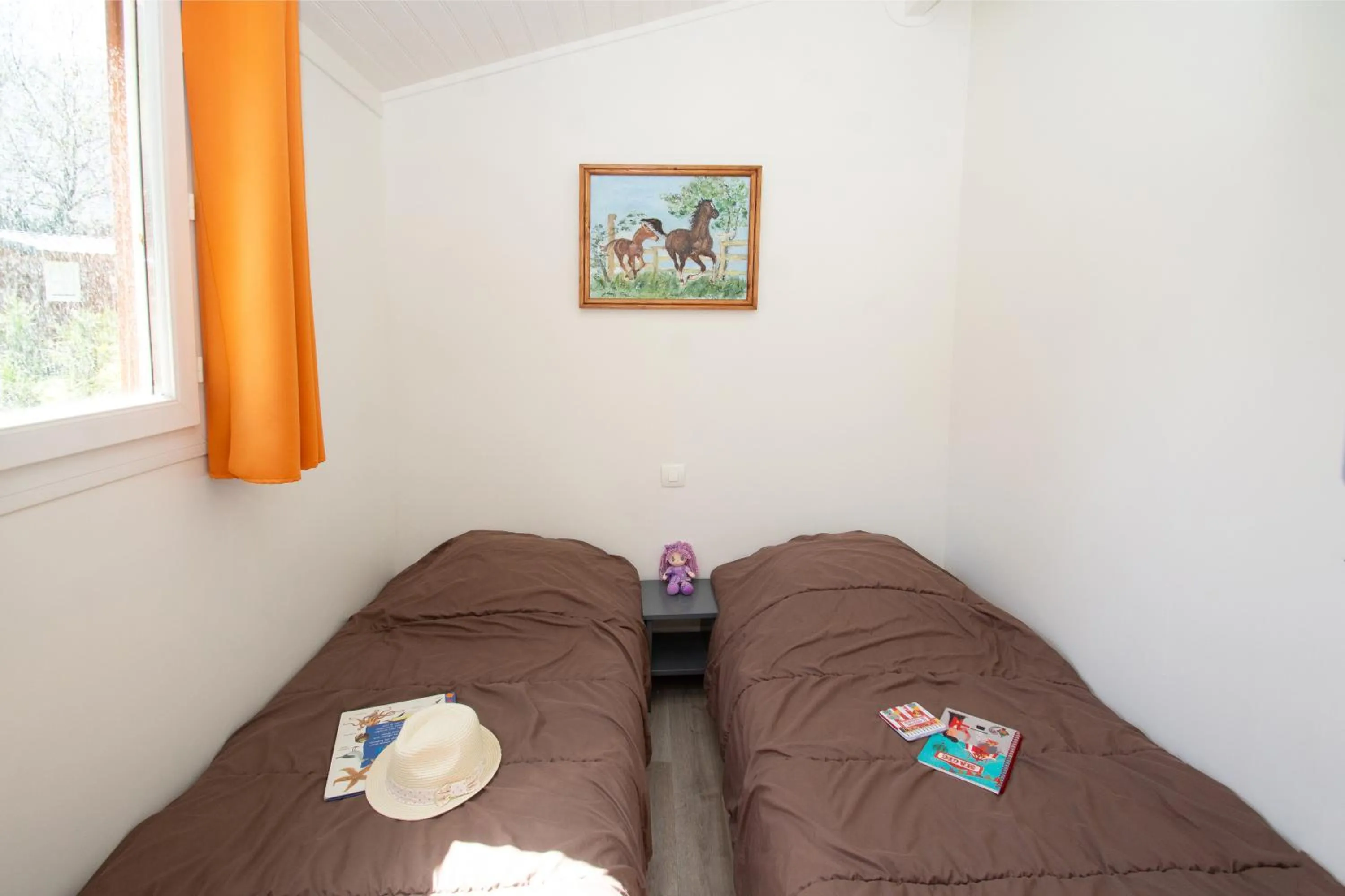 Bed in A La Rencontre Du Soleil - Camping
